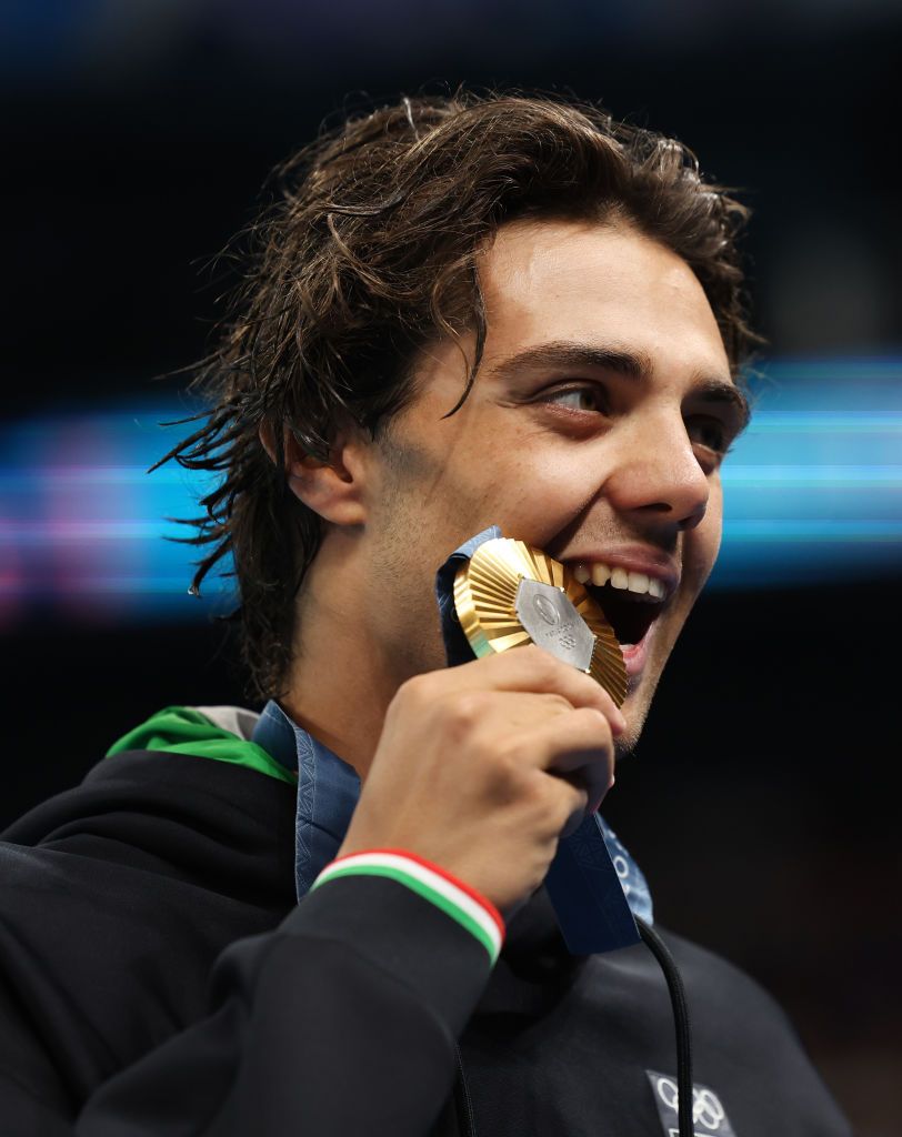 NANTERRE, FRANCE - JULY 29: Thomas Ceccon of Team Italy poses with his medal after winning gold in the Men’s 100m Backstroke Final on day three of the Olympic Games Paris 2024 at Paris La Defense Arena on July 29, 2024 in Nanterre, France. (Photo by Ian MacNicol/Getty Images) (Photo by Ian MacNicol/Getty Images)