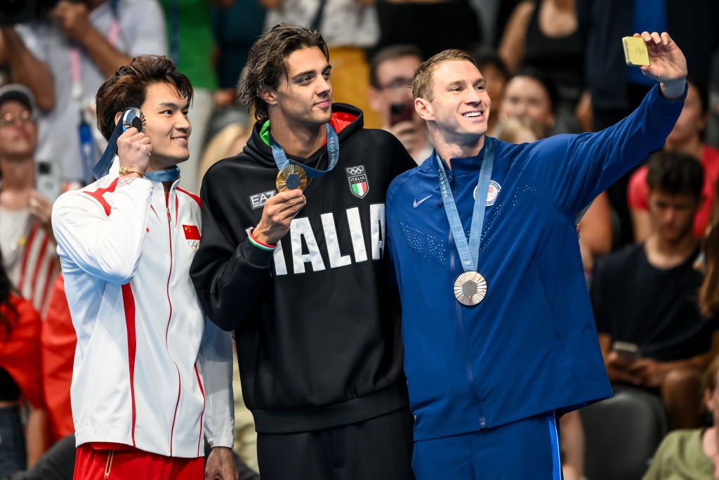 Jiayu Xu of China, silver, Thomas Ceccon of Italy, gold, and Ryan Murphy of United States of America, bronze, make a selfie with medals after competing in the swimming 100m Backstroke Men Final during the Paris 2024 Olympic Games at La Defense Arena. Paris (France), July 29th, 2024. (Photo by DBM/Insidefoto/Mondadori Portfolio via Getty Images)