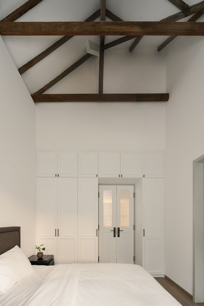 These practical storage units are a pleasing visual match with the bedroom doors