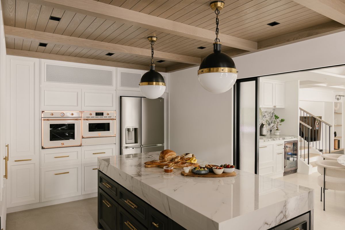 White surfaces lend and airy touch to the kitchen