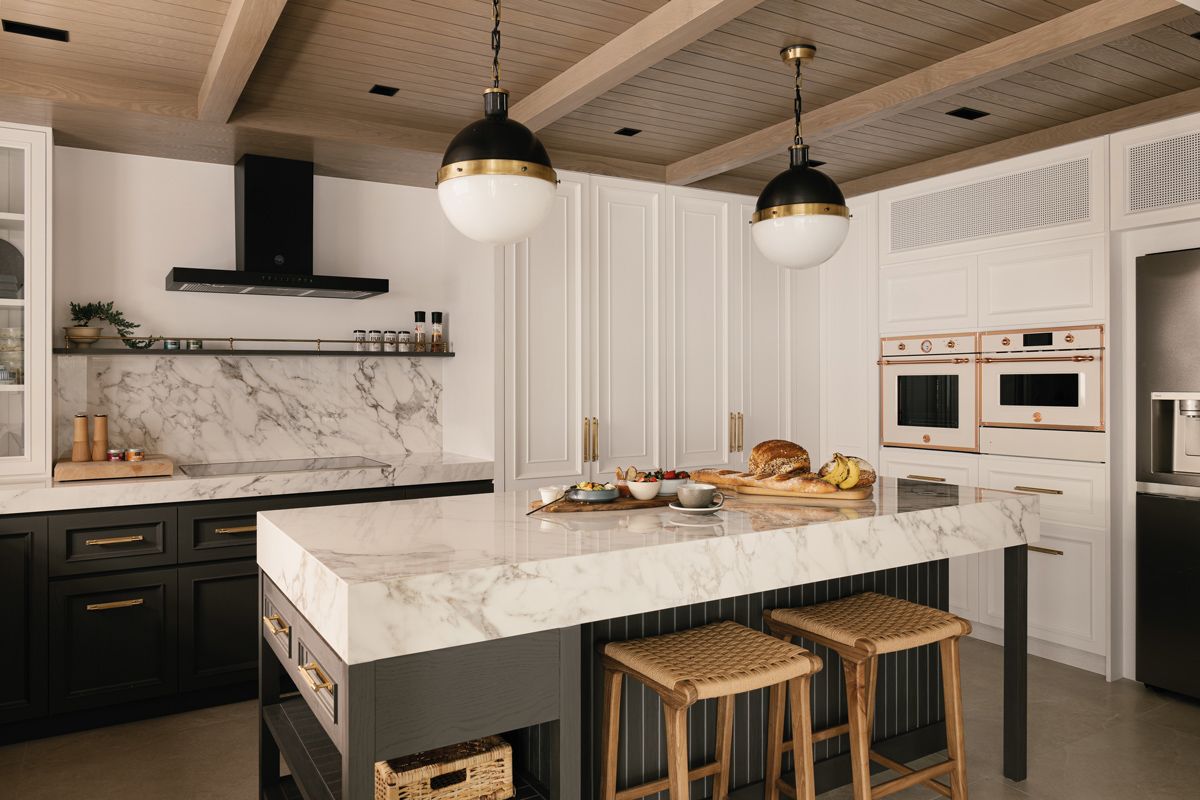 The kitchen island doubles as a stylish breakfast counter