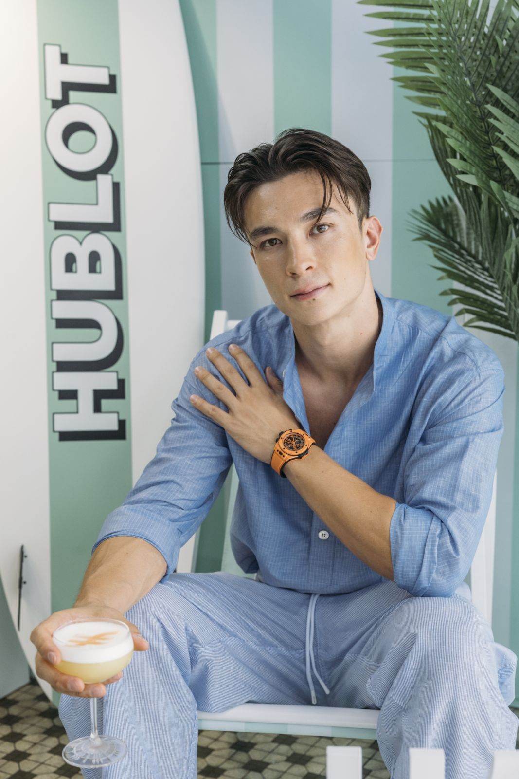 Matt Orr wearing the Hublot Big Bang Unico Orange Ceramic and sipping on the Unico Sour cocktail (Photo: courtesy of Hublot)