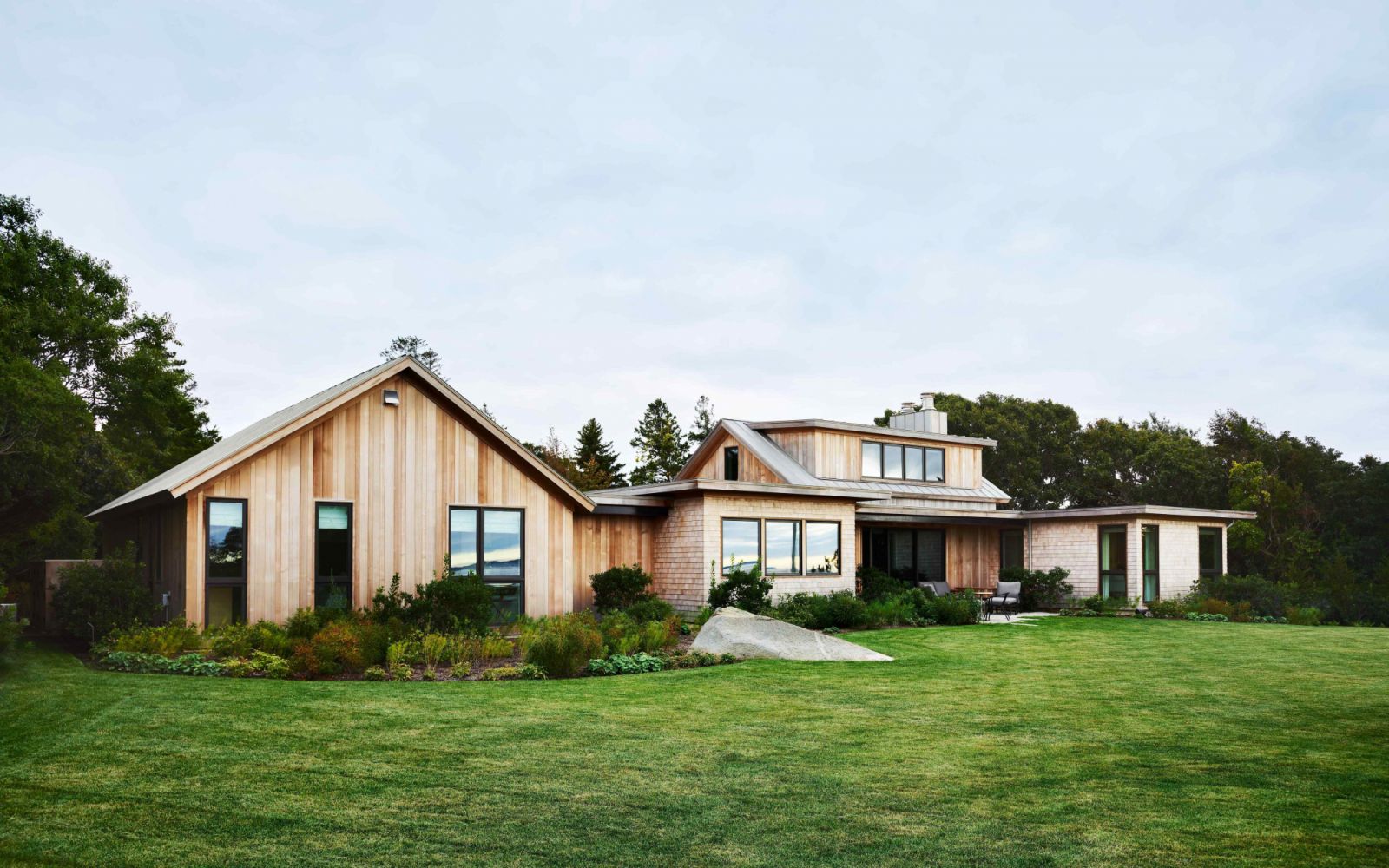 The new vernacular style blends traditional architectural principles with contemporary sensibilities