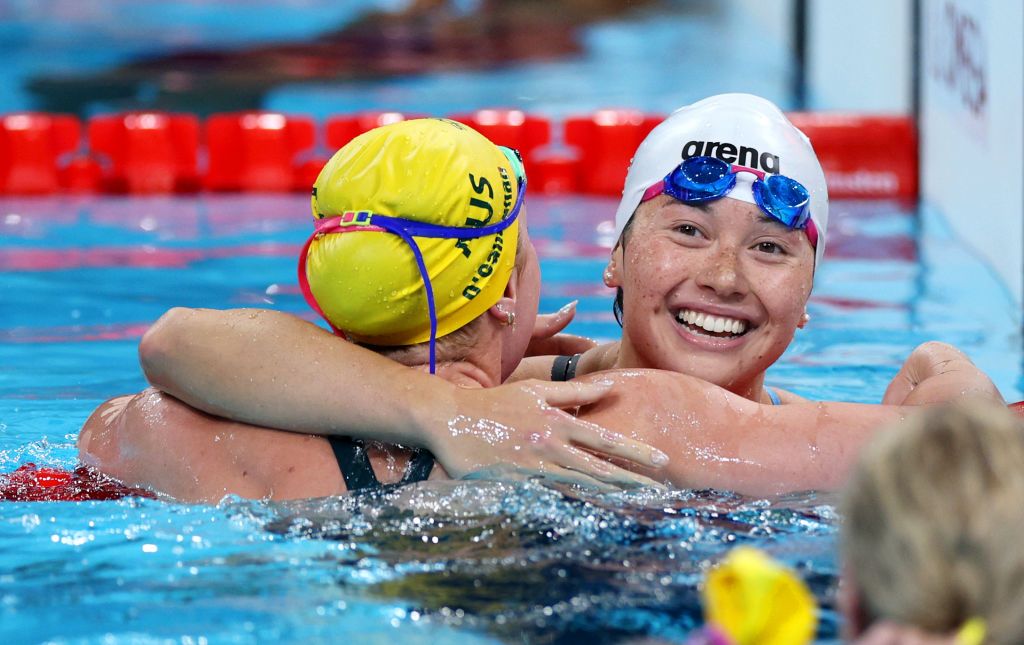 Hong Kong athlete Haughey hugs Mollie O'Callaghan from Australia after competing in the women's 200m freestyle final at Paris 2024 Olympics (Photos: Getty Images)