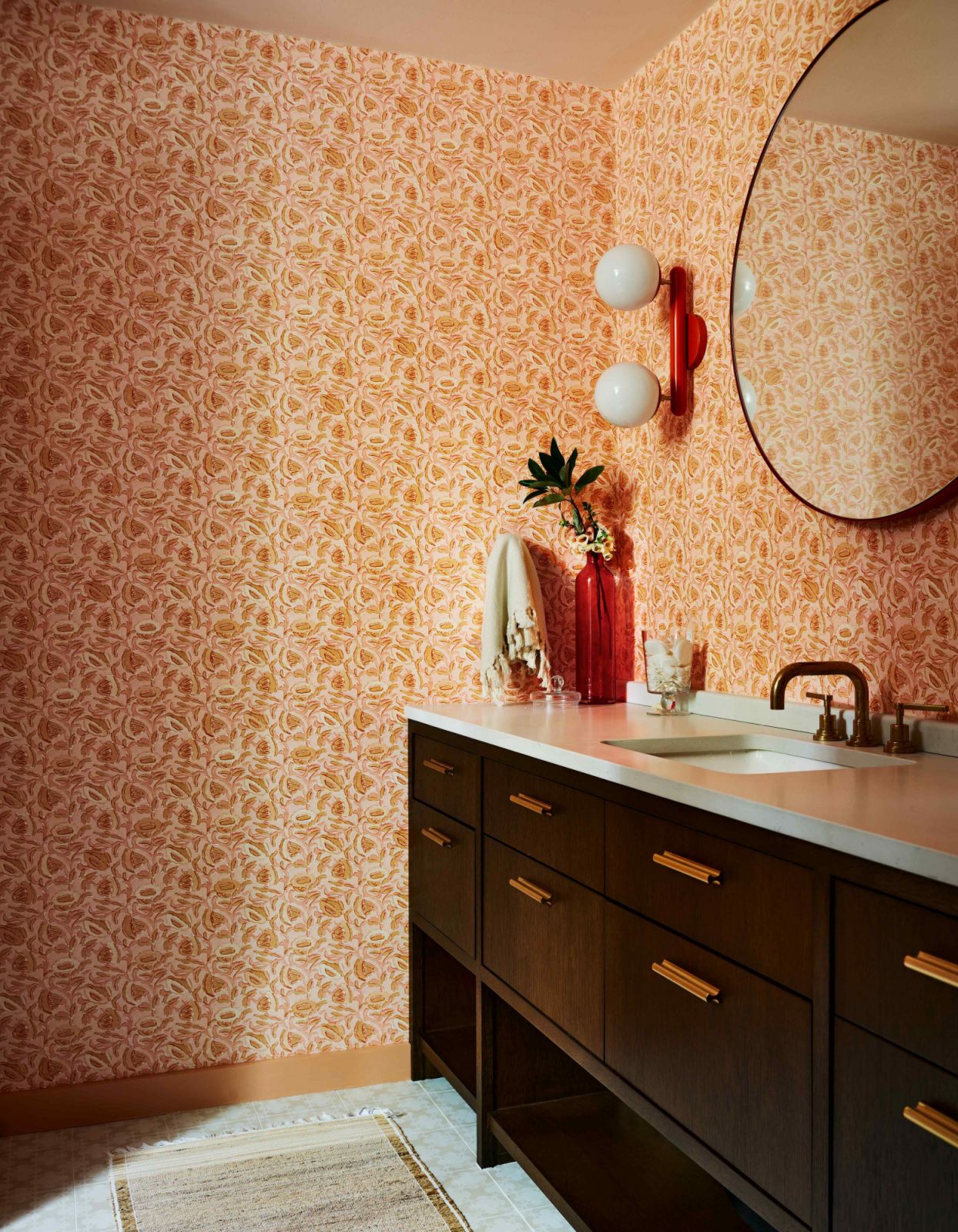 The ensuite in Kay's bedroom is awash in bright orange