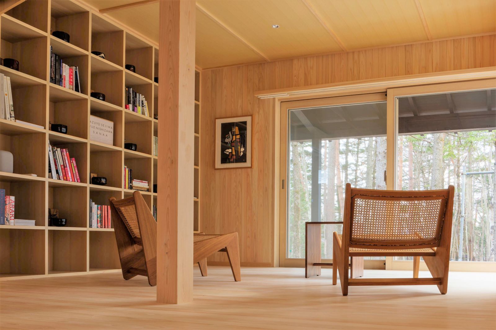Pierre Jeanneret's Easy Chairs in the hinoki-wood clad cabin villa (Photo: Kenichi Suzuki)