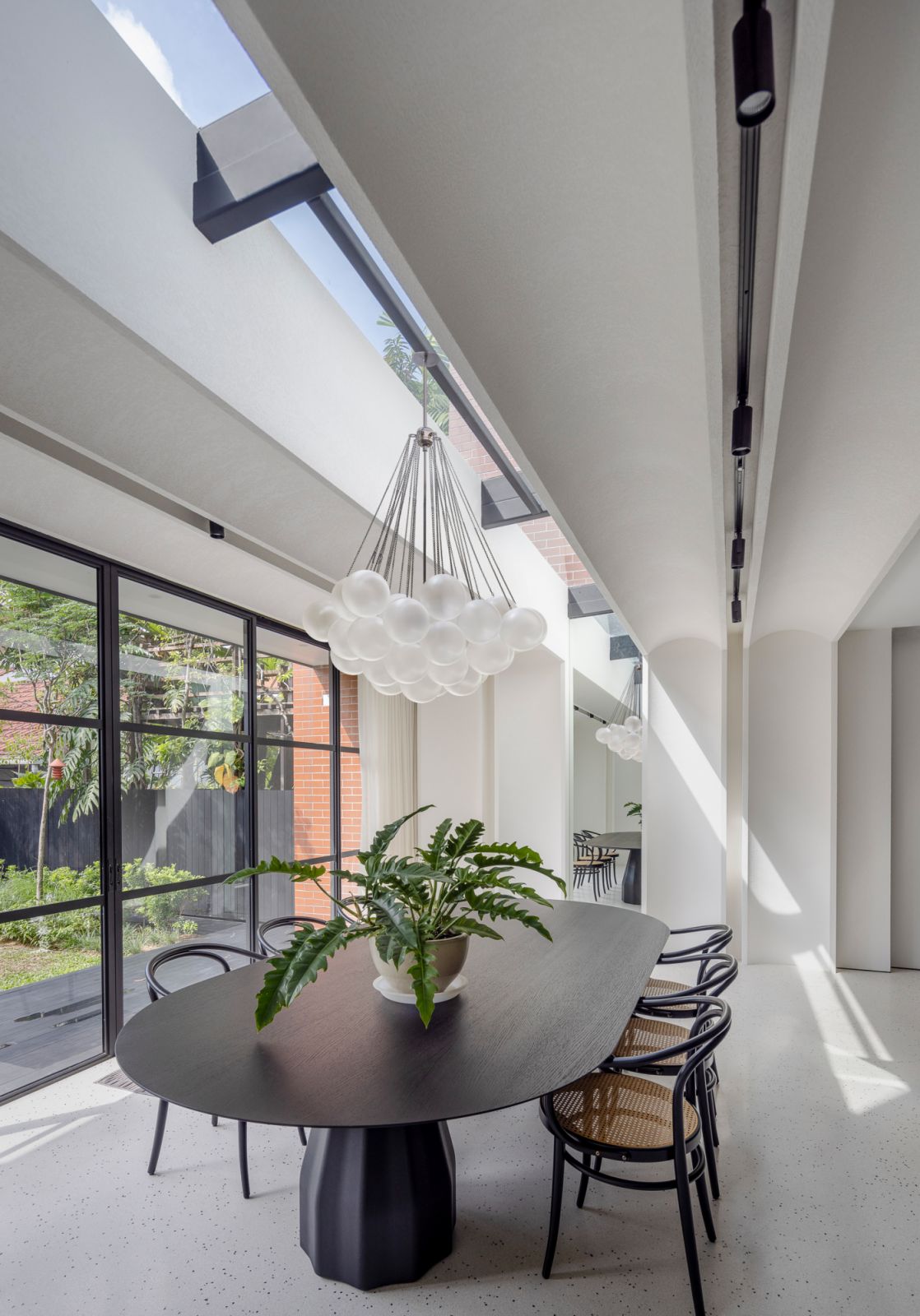 The Light House dining room by Formwerkz Architects