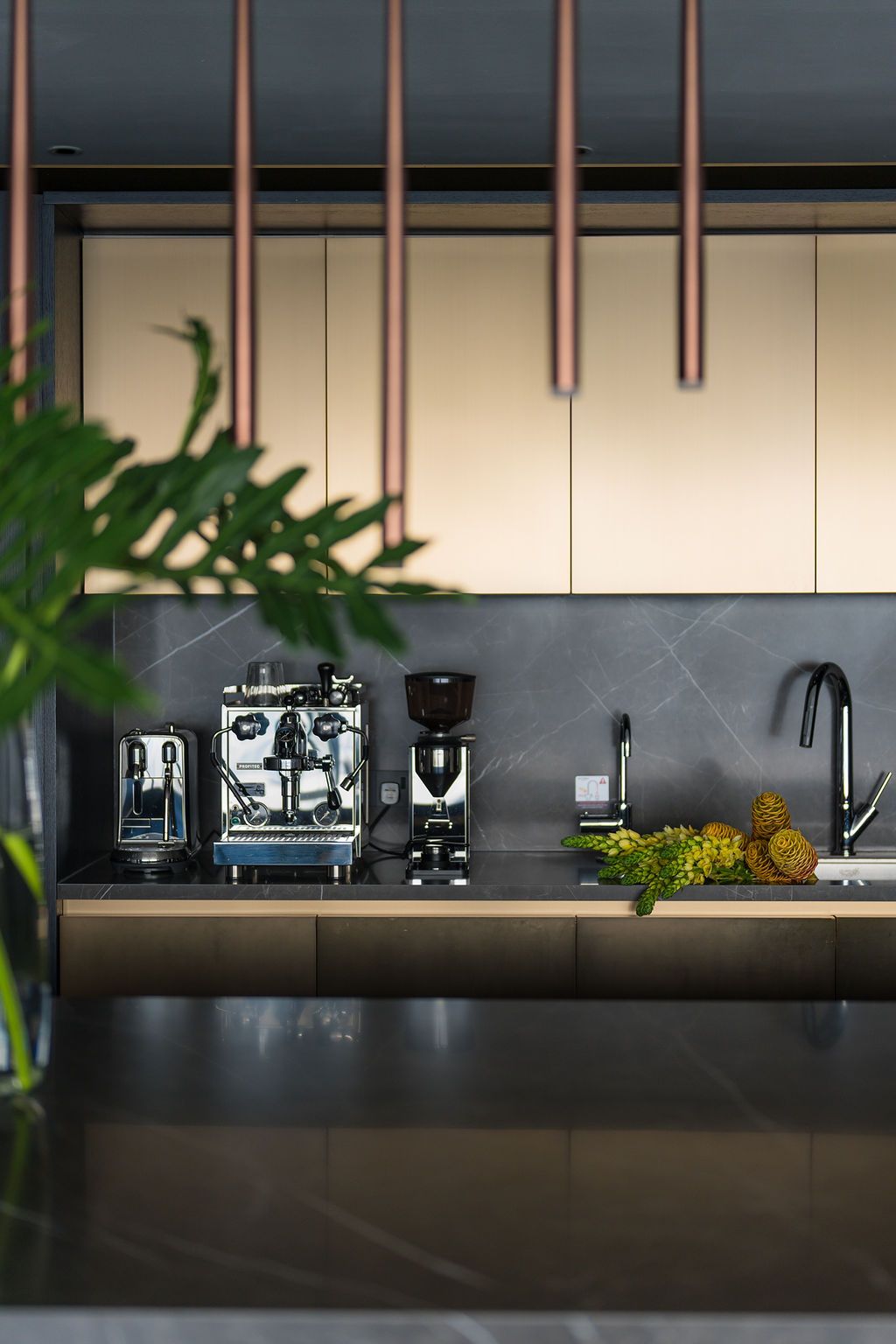The dry kitchen has a darker feel compared to the living room
