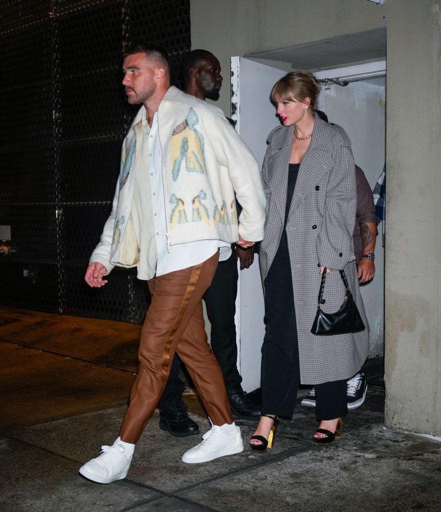 NEW YORK, NEW YORK - OCTOBER 15: Travis Kelce and Taylor Swift depart the SNL Afterparty on October 15, 2023 in New York City. (Photo by Gotham/GC Images)