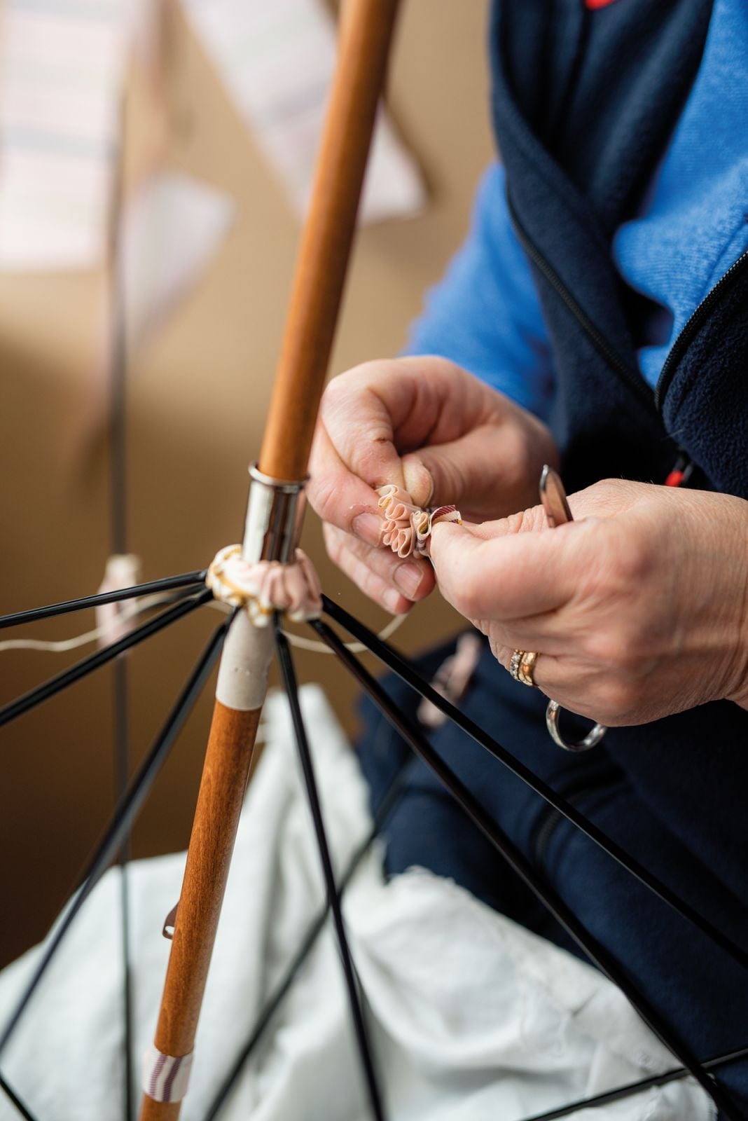 A Francesco Maglia umbrella being assembled by hand