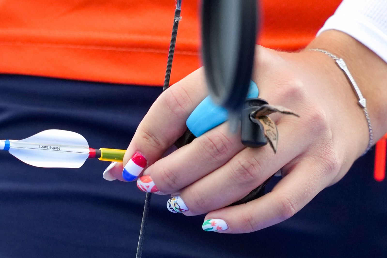 PARIS, FRANCE - JULY 25: A detailed view of art on the nails of Laura van der Winkel of the Netherlands before competing in the Women's Individual Ranking Round during Day -1 of Archery - Olympic Games Paris 2024 at Esplanade Des Invalides on July 25, 2024 in Paris, France. (Photo by Rene Nijhuis/BSR Agency/Getty Images)