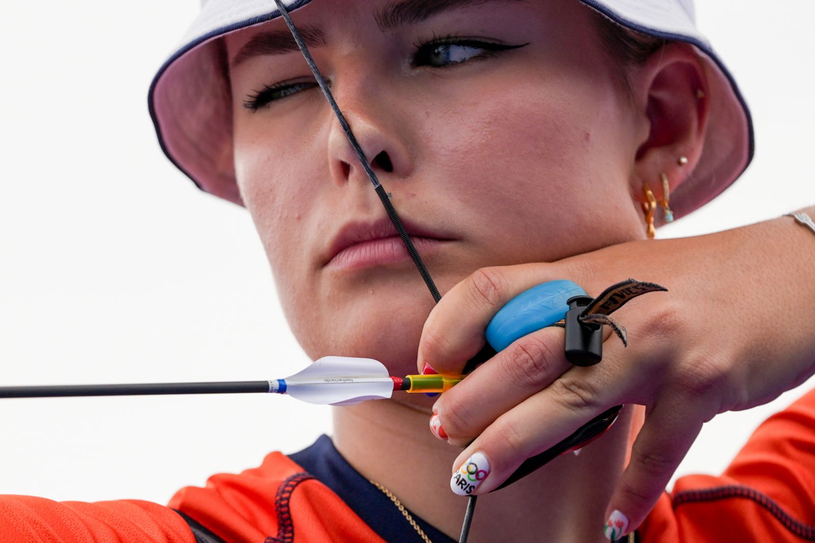 PARIS, FRANCE - JULY 25: Laura van der Winkel of France competes in the qualification round of women's individual archery, with her Olympics-themed nails in Paris, France on July 25, 2024. (Photo by Mustafa Ciftci/Anadolu via Getty Images)