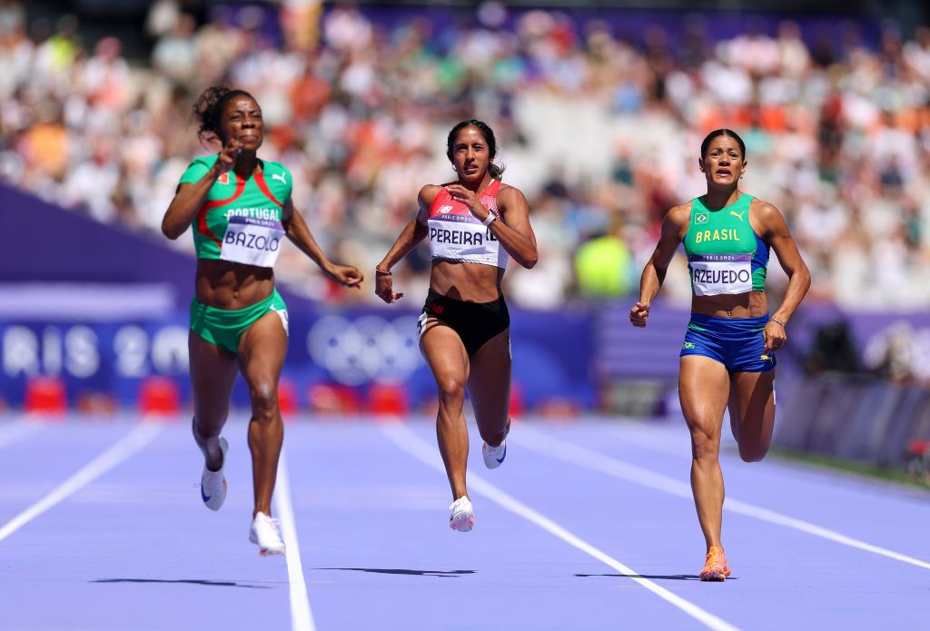 Lorène Bazolo from Portugal, Shanti Pereira from Singapre and Ana Azevedo from Brazil compete at the women’s 200m repechage at Paris 2024 Olympics (Photo: Getty Images)