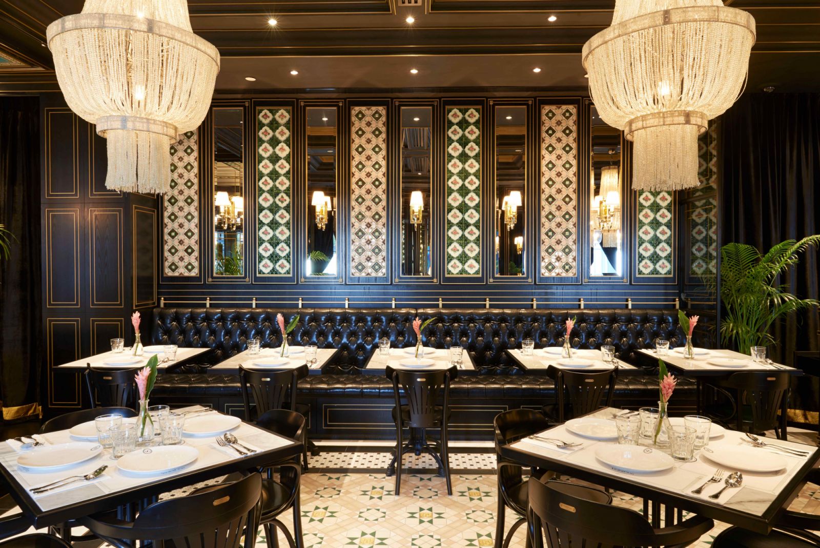 Vintage Peranakan tiles salvaged from old shophouses adorn the wall panels (Photo: LAANK)