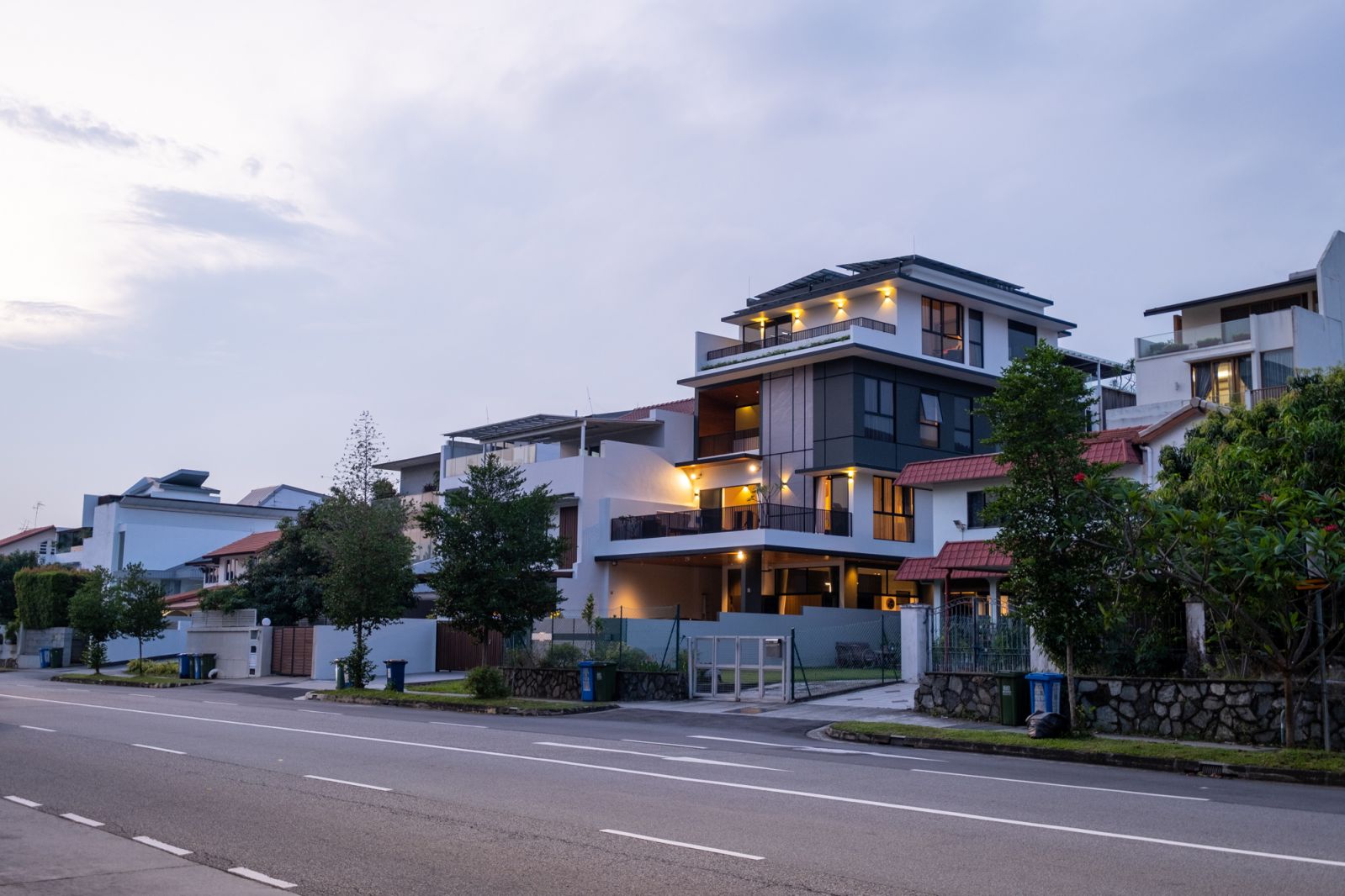 The sun setting over the semi-detached house