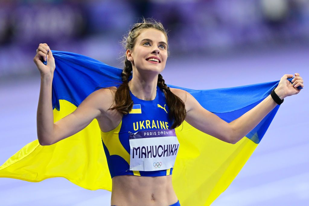 PARIS, FRANCE - AUGUST 04: Gold medalist Yaroslava Mahuchikh of Team Ukraine celebrates during the Women's High Jump Final on day nine of the Olympic Games Paris 2024 at Stade de France on August 04, 2024 in Paris, France. (Photo by Mehmet Murat Onel/Anadolu via Getty Images)