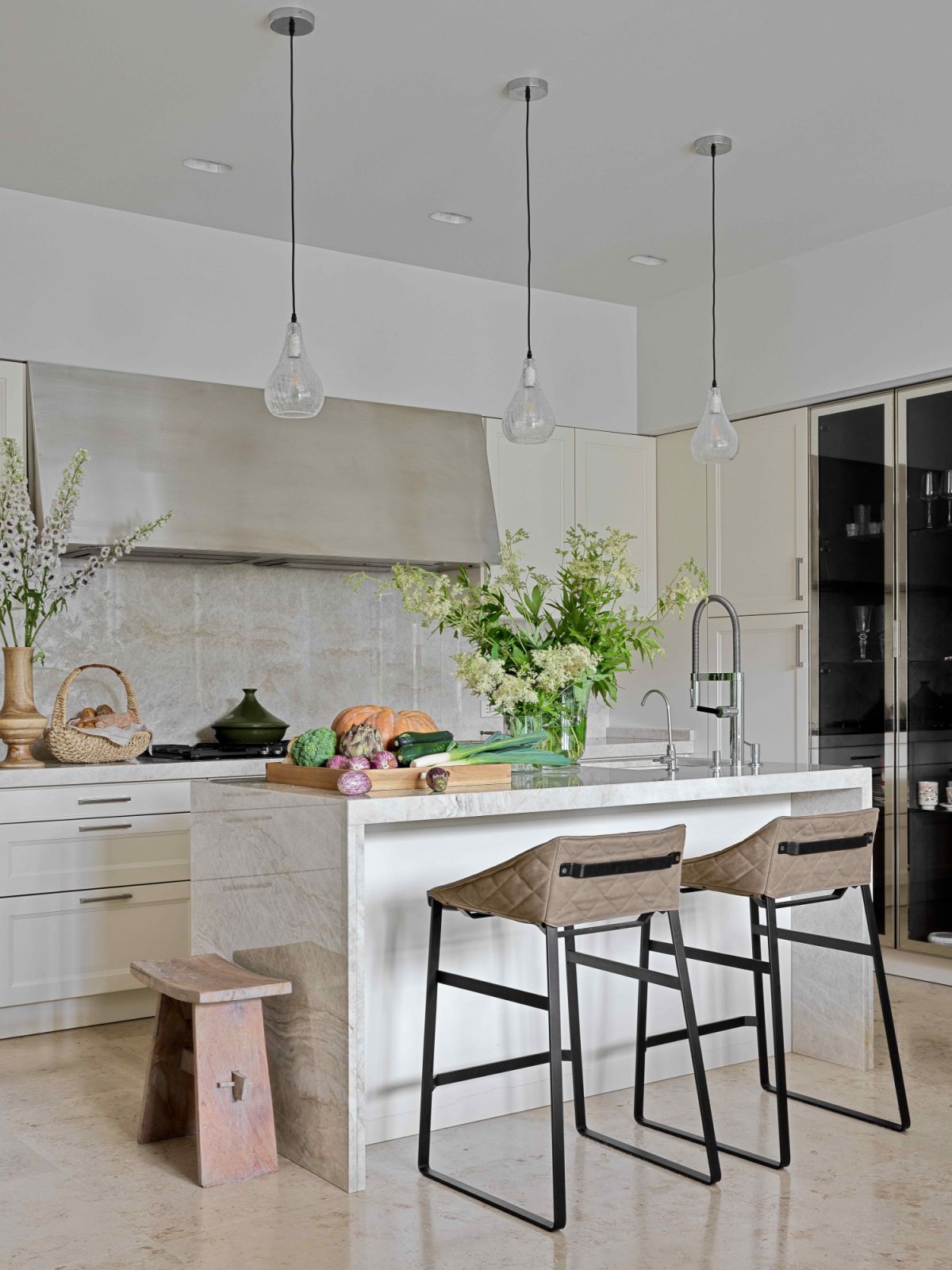 The kitchen with a Taj Mahal marble island