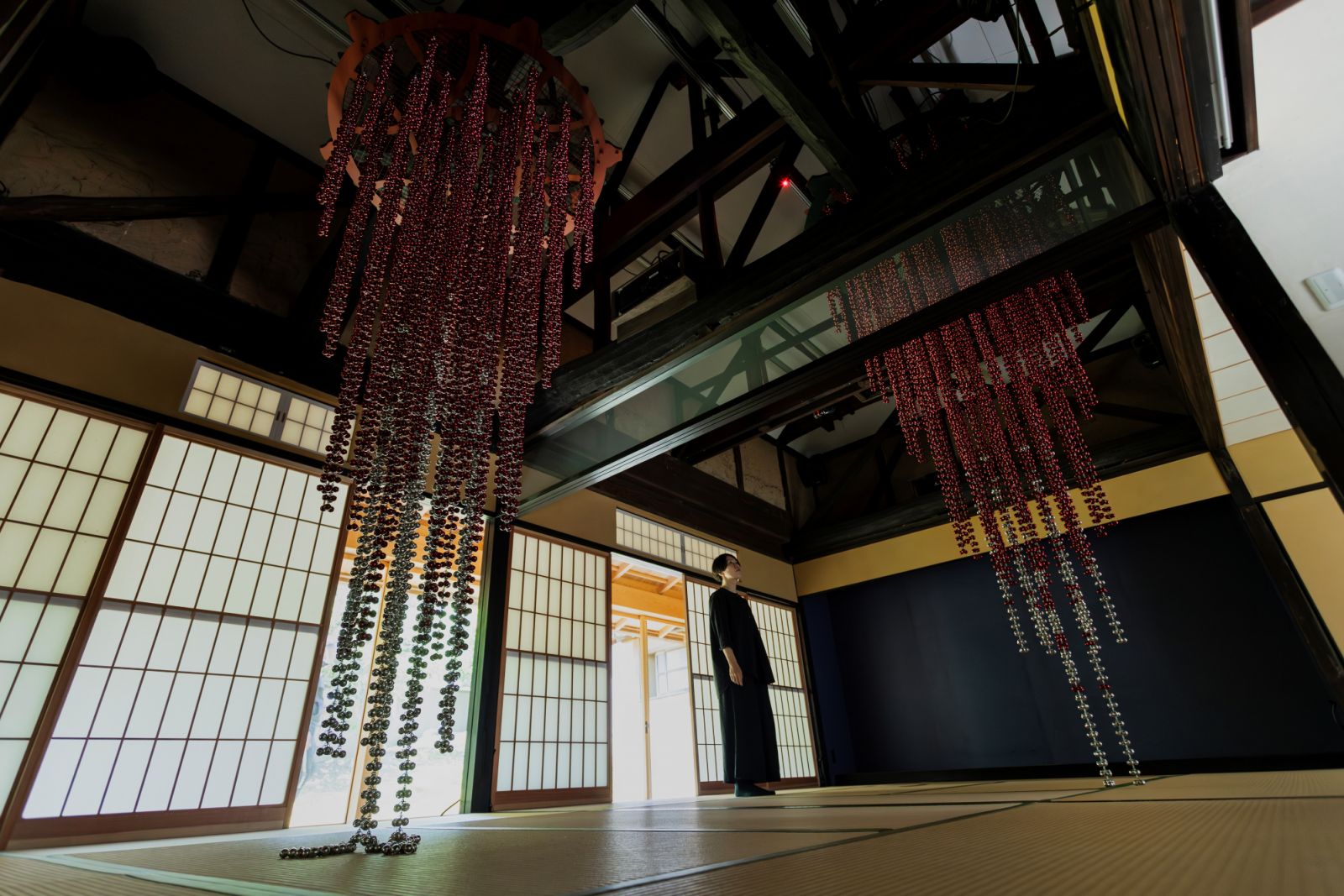 Installation view of Yang's "Sonic Eruption Upside Down – Slender", (2024) "Sonic Eruption Upside Down – Bold" (2024) (from left to right) in Matabe, Naoshima Island, (Photo: Benesse Holdings, Inc. courtesy Kukje Gallery)