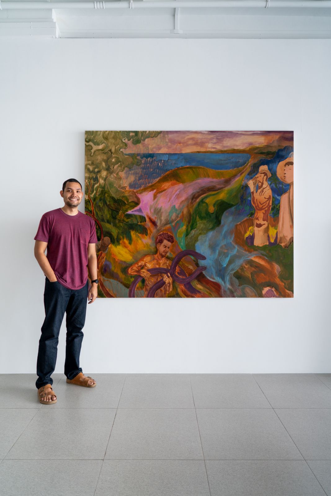 Artist Khairulddin Wahab with one of his works