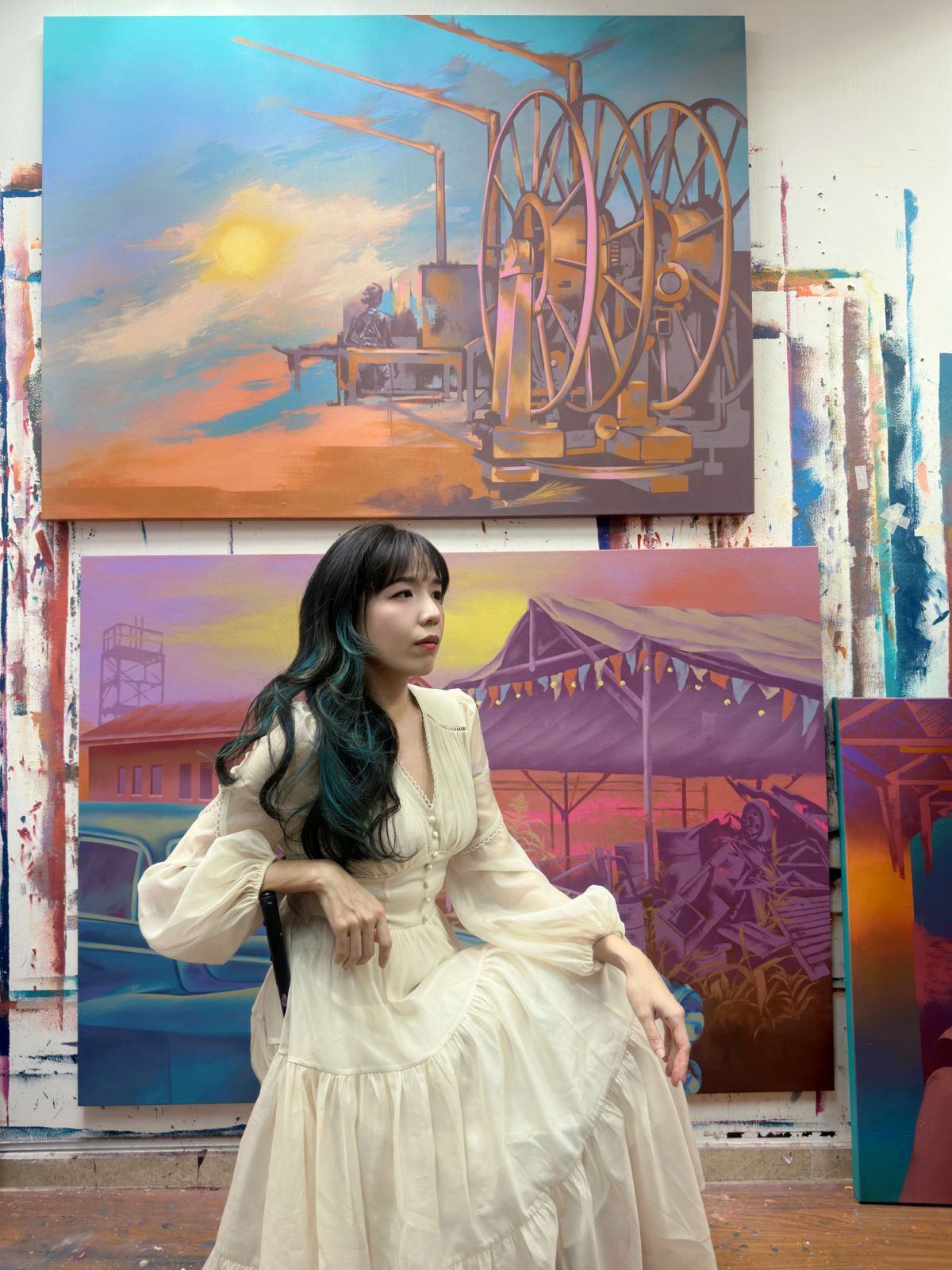 Artist Shen Jiaqi with some of her artworks