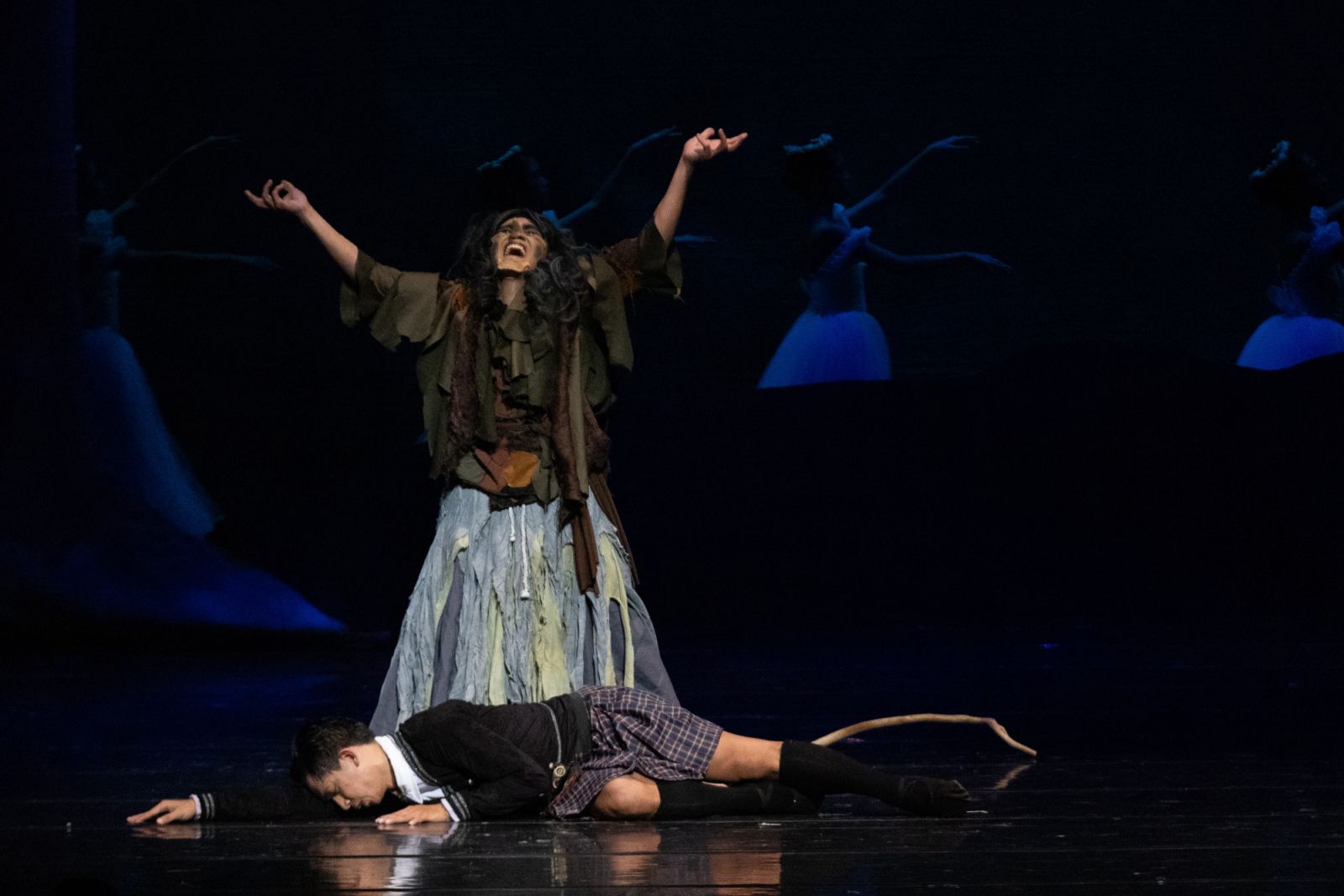 Madge revels in her victory, laughing triumphantly over the lifeless body of James in the haunting final moments of the show