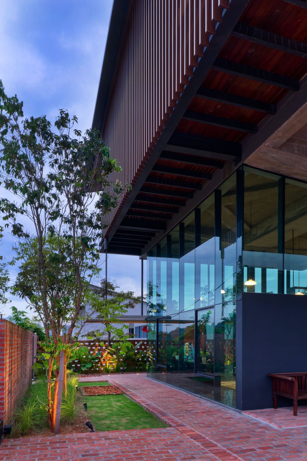 Brise-soleil louvres distinguish the facade