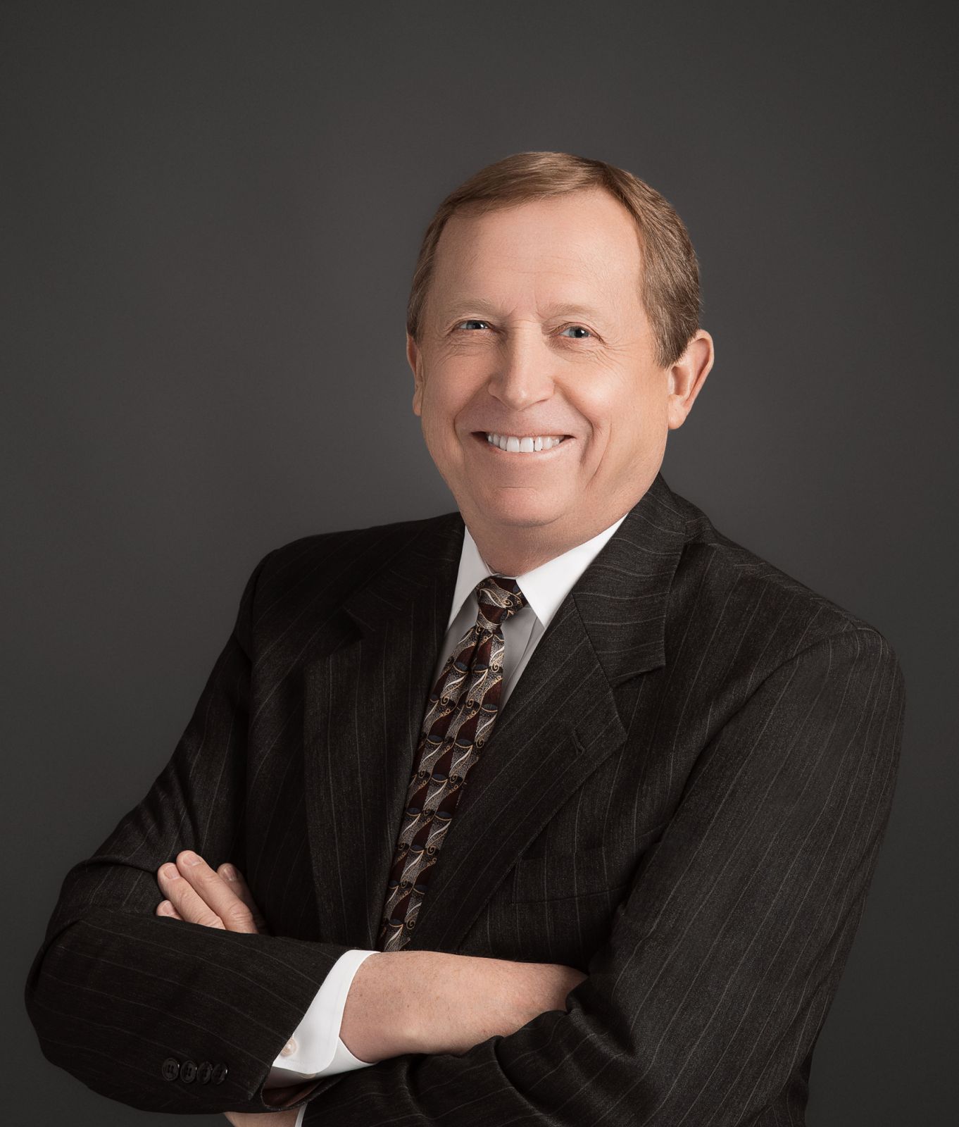 Dr Brent James