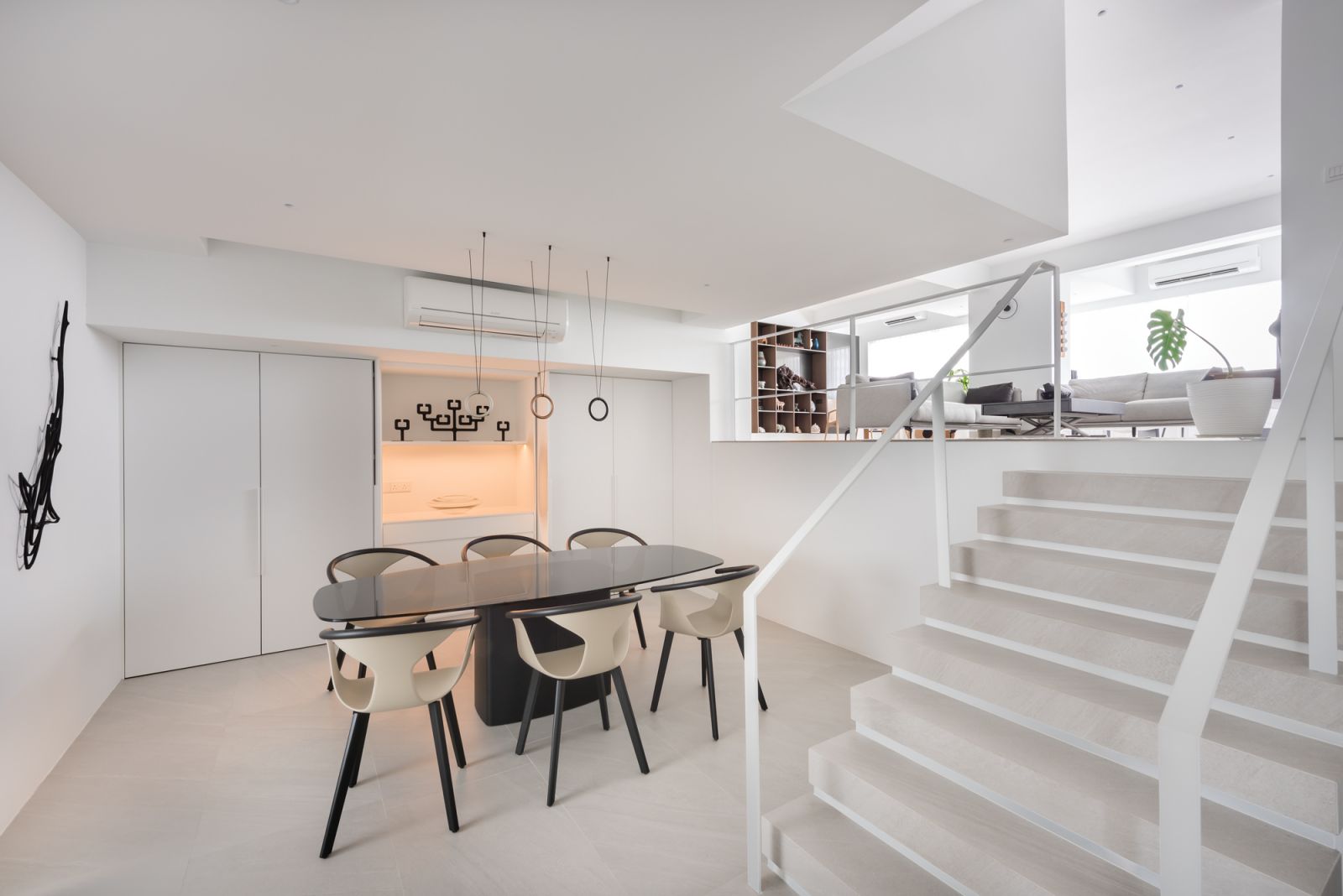 A chic and intimate dining area equipped with convenient pocket doors
