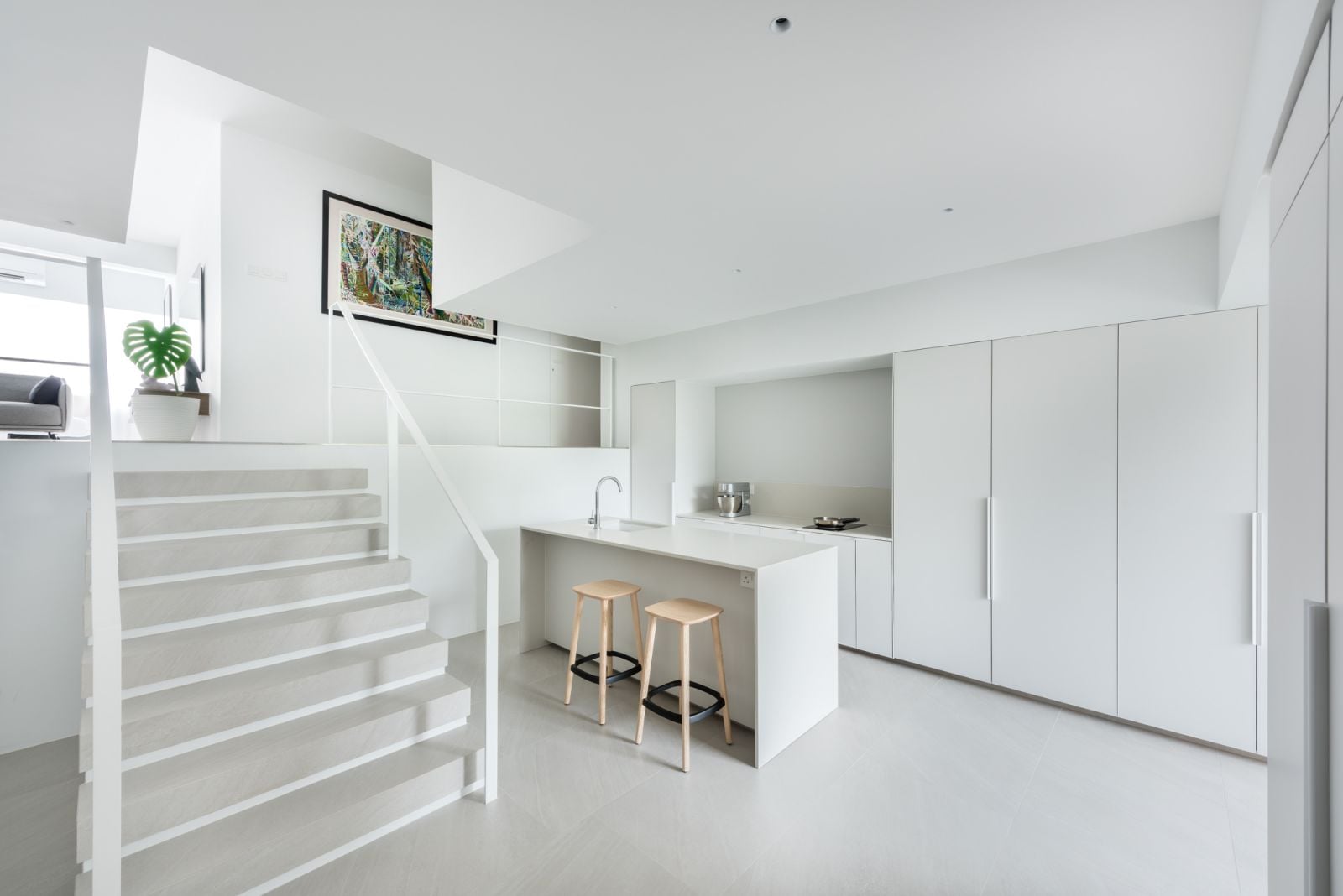 The dry kitchen and built-in island in the condominium apartment