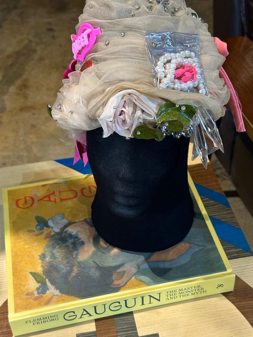 A hat by Jude Macasinag on display at Guava Studios