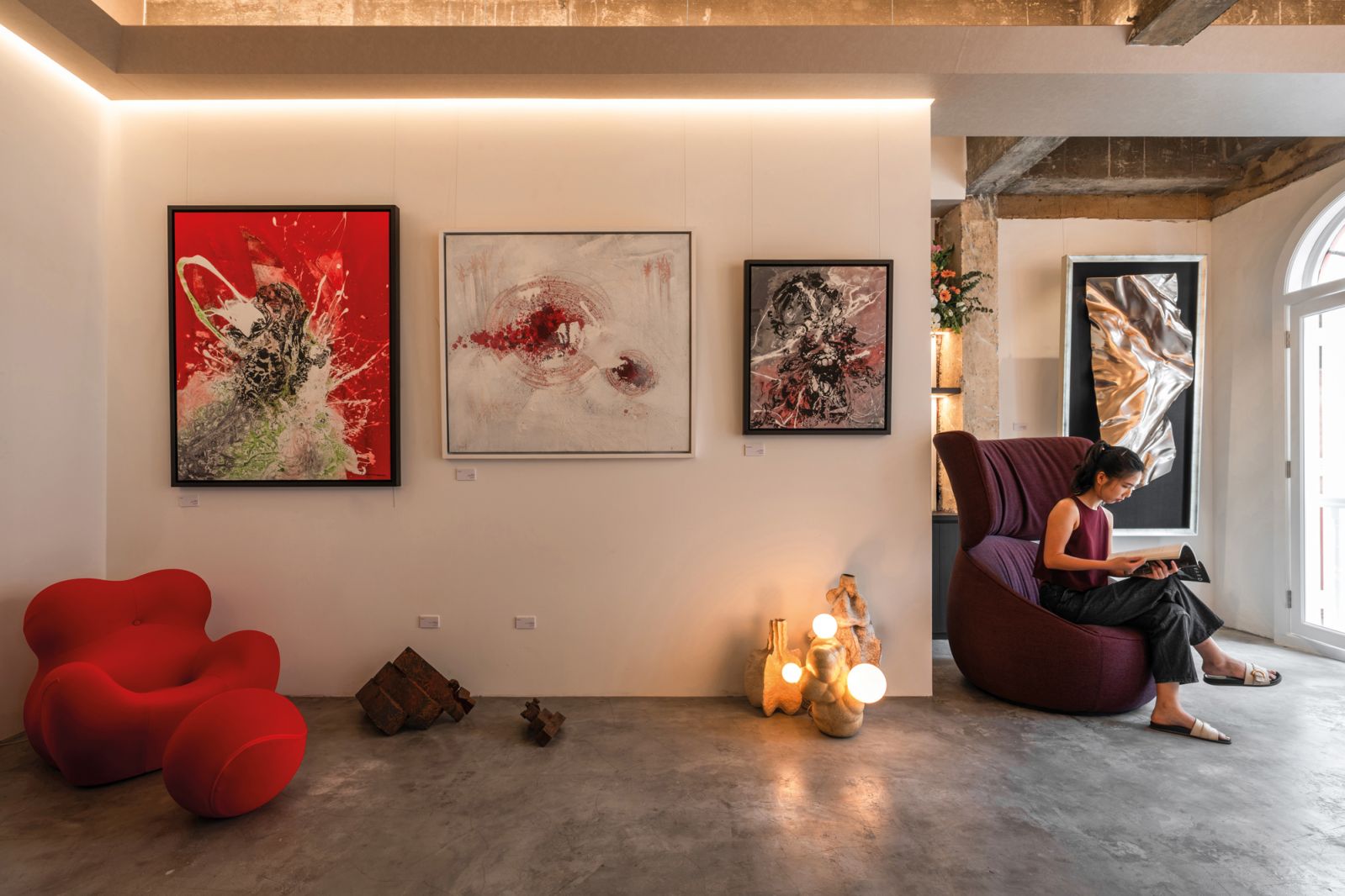 B&B Italia’s iconic Up chair goes well with these vibrant paintings