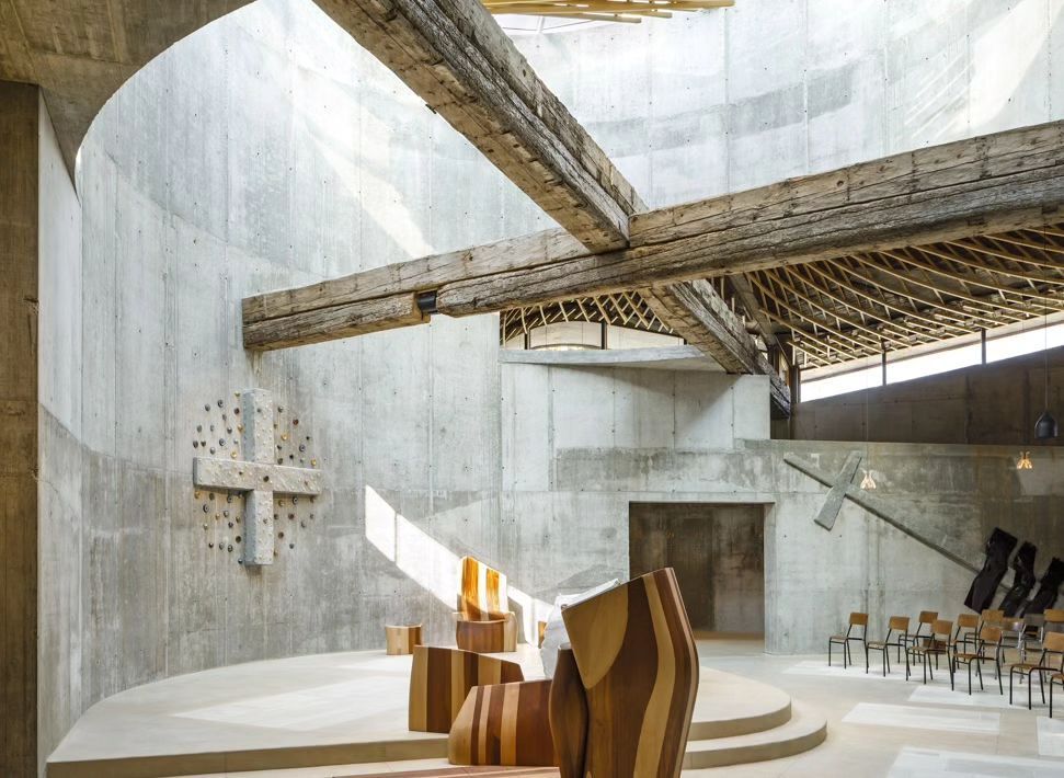 Wooden beams recovered from Ferrara’s old town hall in the shape of a cross (Photo: Instagram / @marcelagrassiphotography)