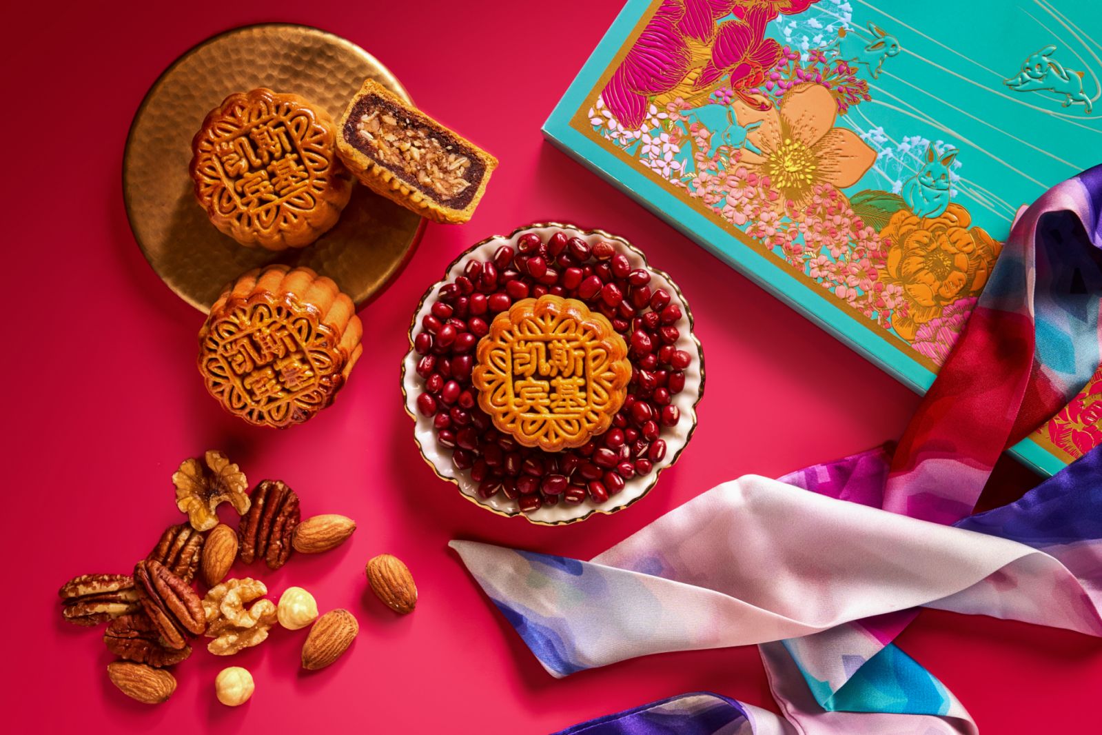 The red bean osmanthus mooncake with a mixed nut filling adds a tantalising crunch to the velvety lotus paste that surrounds it (Photo: The Capitol Kempinski Hotel Singapore)