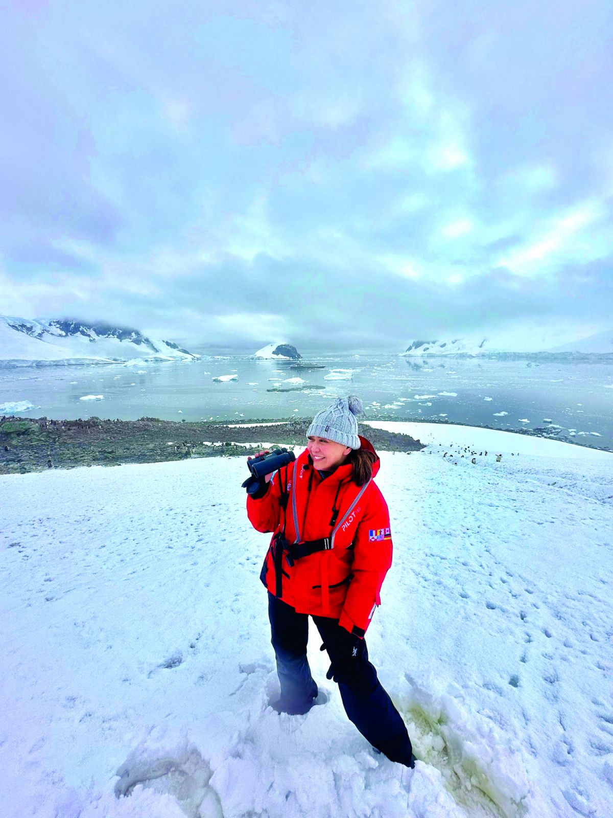 Karen Davila with an Antarctic cruise essential: binoculars (Image courtesy of Karen Davila)