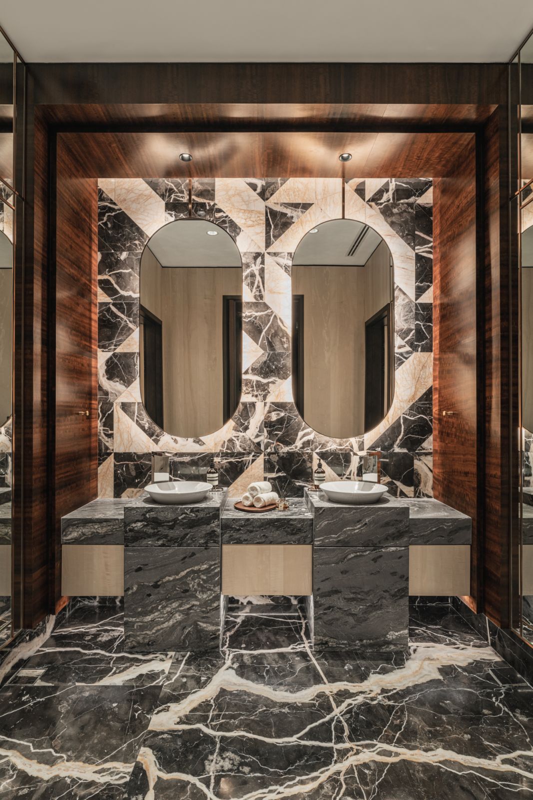 A medley of stone and wood makes for an arresting double vanity