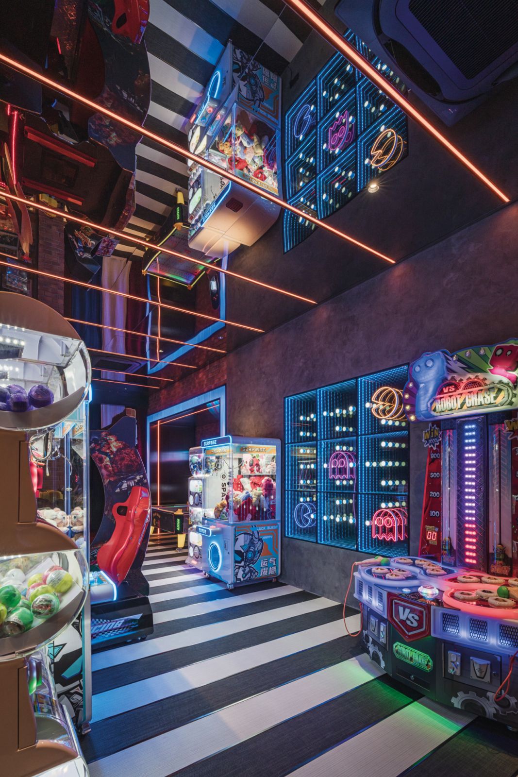 The arcade is an unapologetic reimagining of neon-washed 1980s establishments, complete with all the game machines and deluxe kitschy details