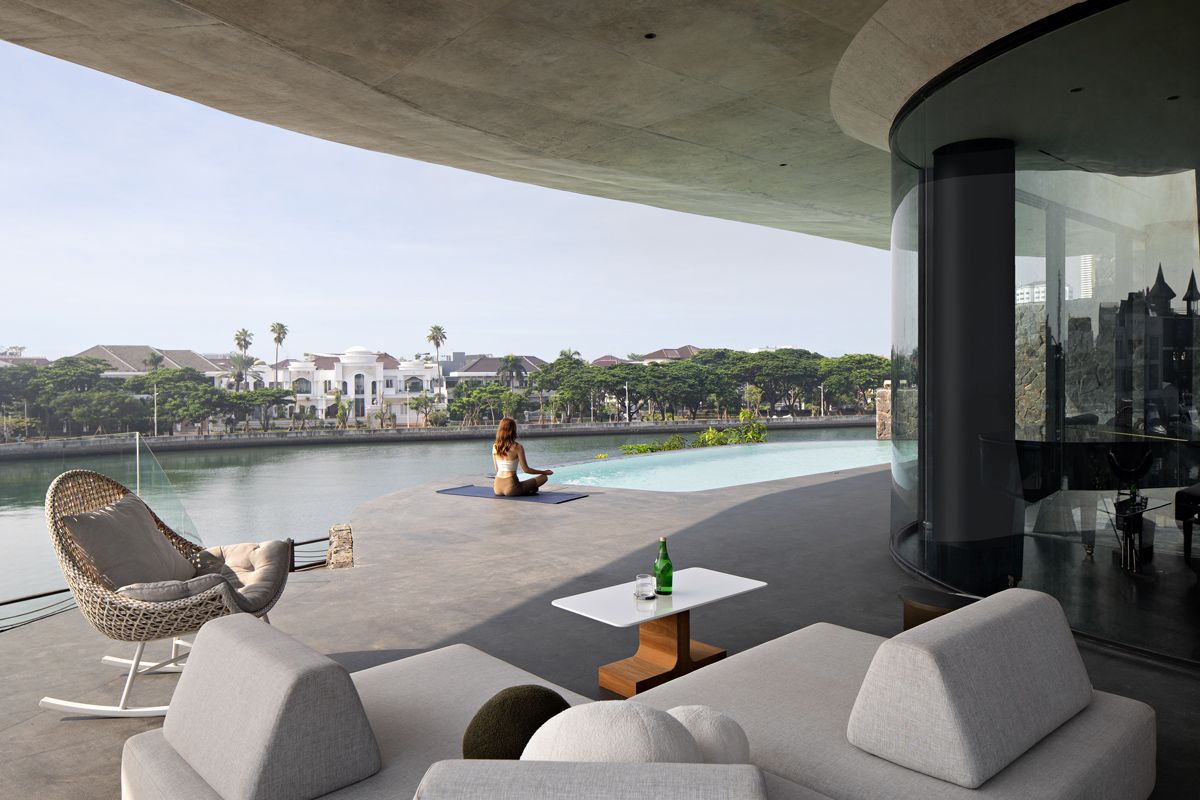 This outdoor area on the second level does double duty as a zone for socialising or a spot for quiet contemplation
