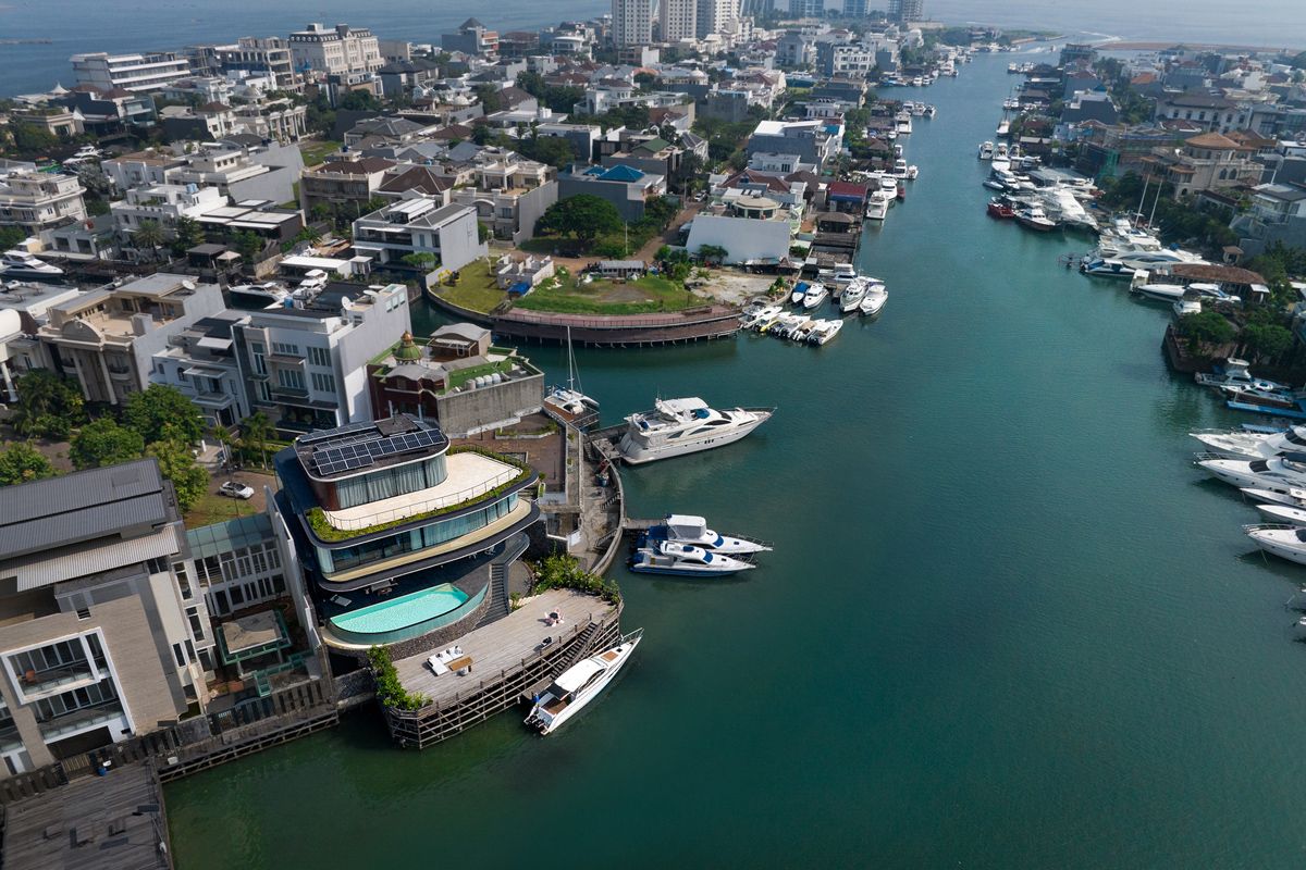 A daytime aerial view of the residential neighbourhood, the only one in Jakarta with private jetties