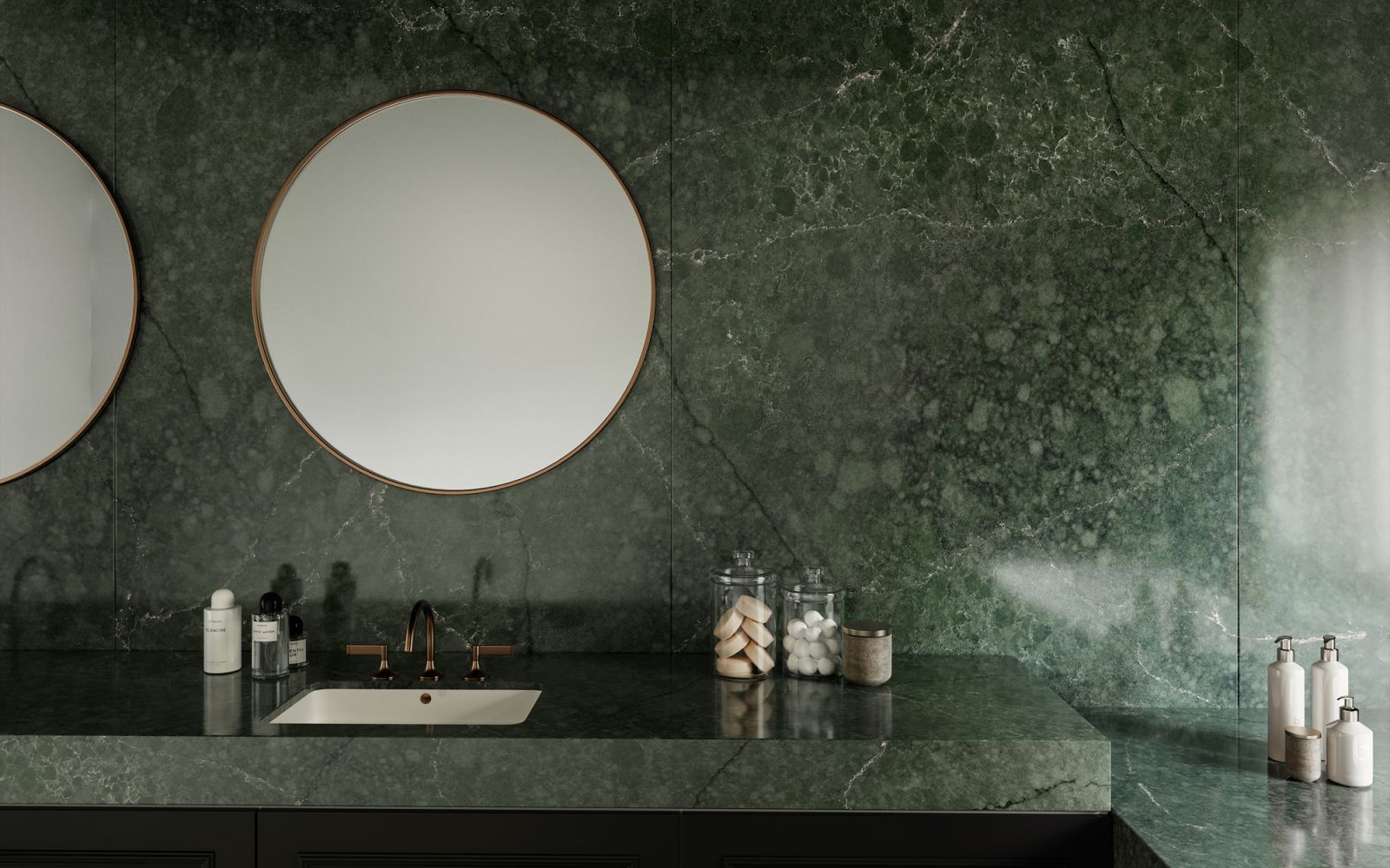 Bathroom details clad in Jardin Emerald, a deep green marble-inspired surface in Cosentino’s new Le Chic Bohème collection