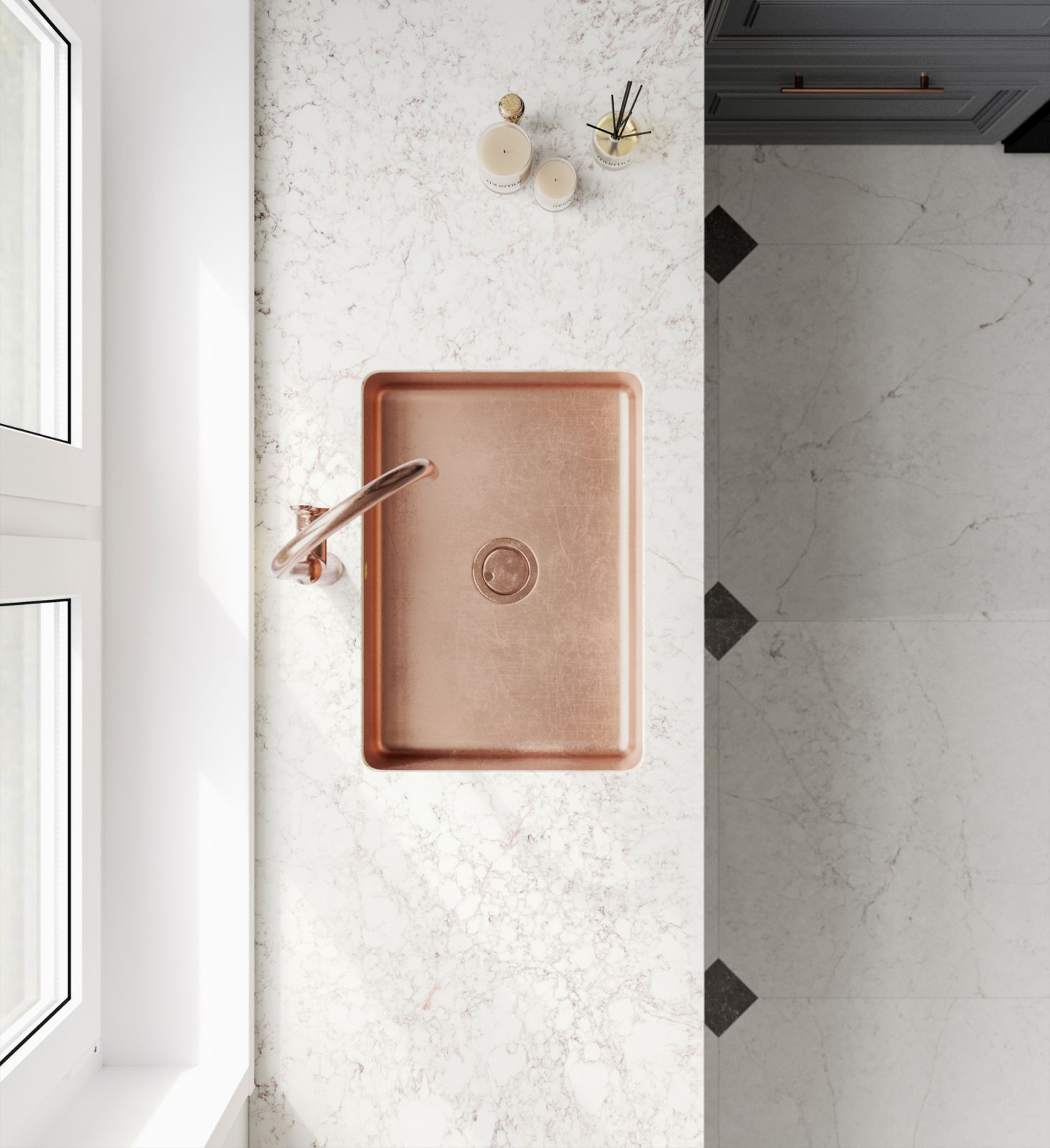 The rose gold kitchen sink complements the Rivière Rose countertop beautifully