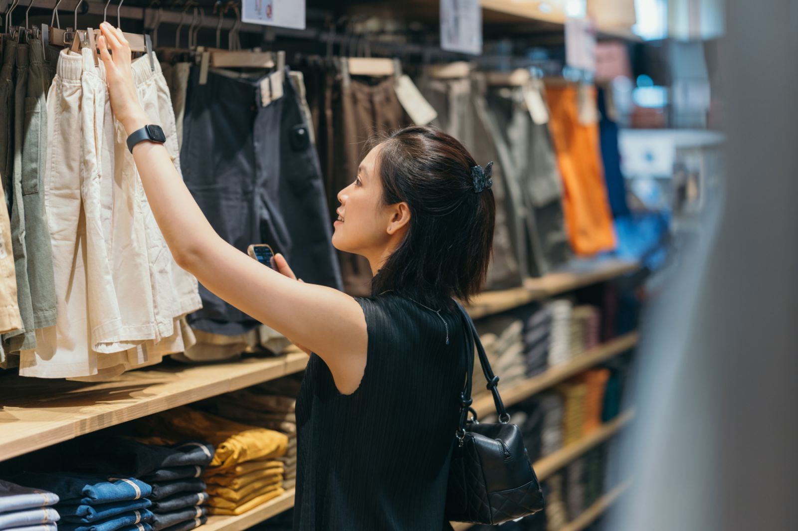 Asian gen-Z shopping moment choosing cloths and fashion costume new style in department store bangkok thailand
