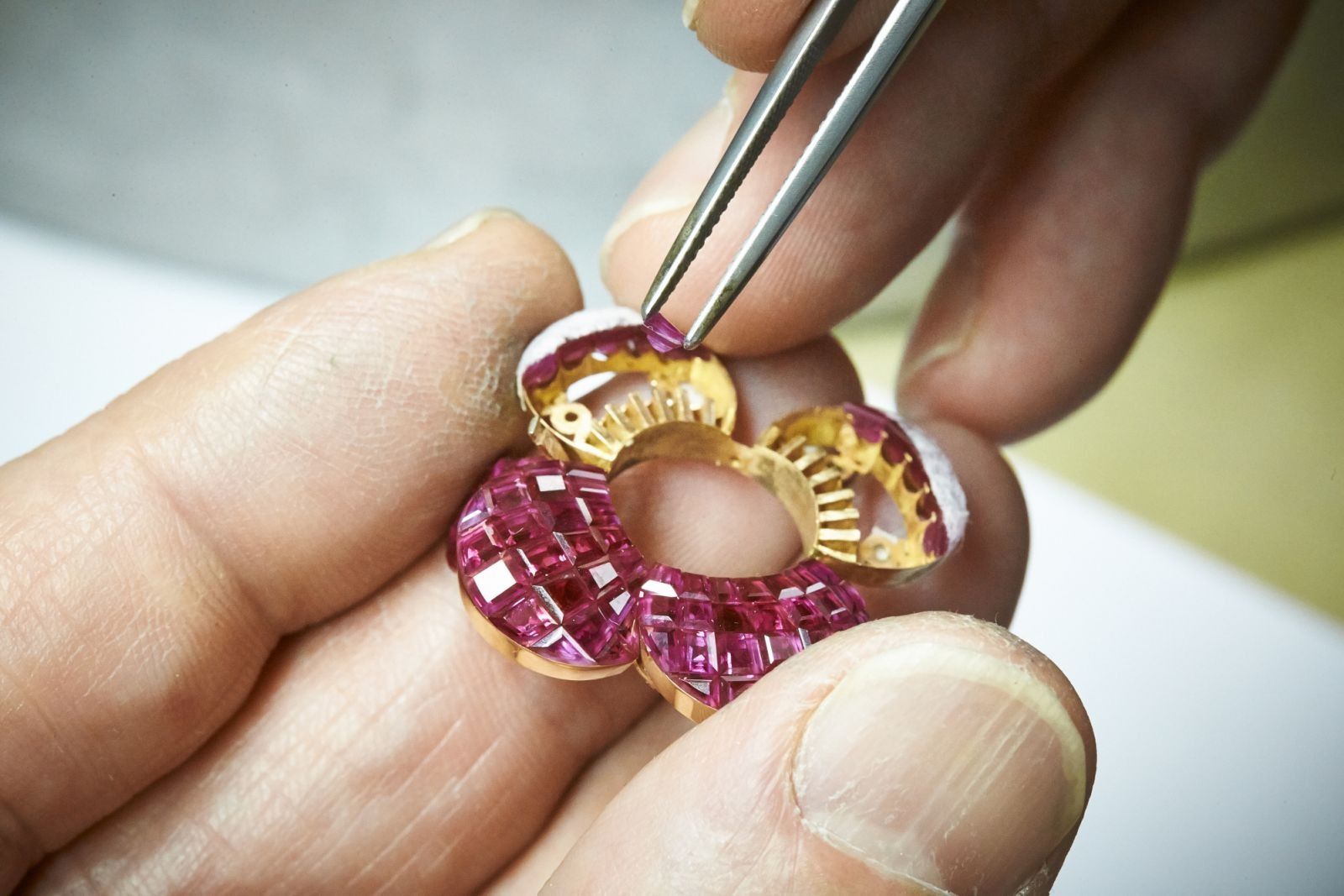 Jewellers attach rubies to rails (photo: Van Cleef & Arpels)