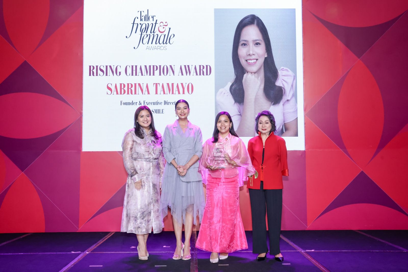 Sabrina Tamayo receiving the Rising Champion Award, presented by Cong. Camille Villar, Rissa Trillo and Chit Lijauco of Tatler Philippines