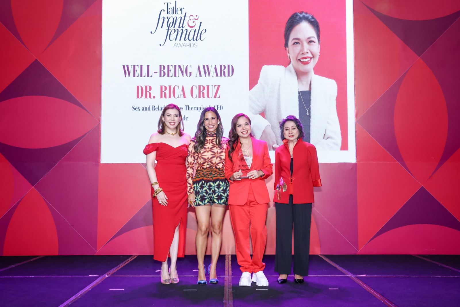Dr. Rica Cruz receiving the Well-being Award, presented by Stephanie Zubiri, Erica Concepcion Reyes and Chit Lijauco