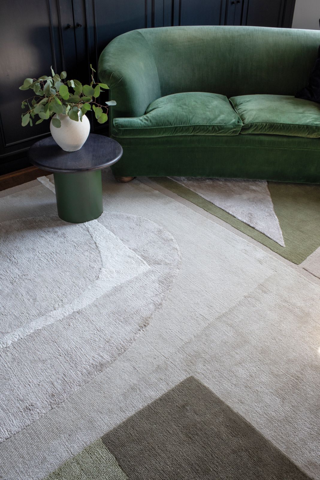 A close-up look of the Auray rug reveals its paper collage aesthetics