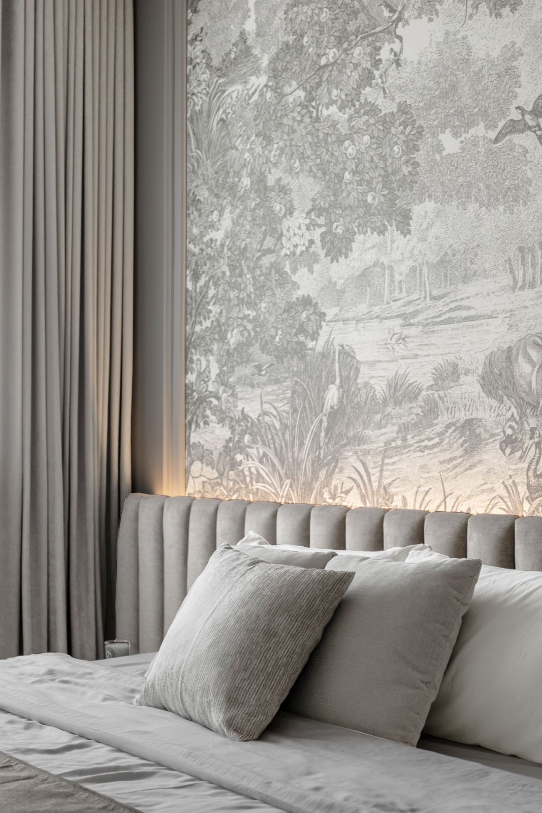 Wallpaper behind the bed is a opulent touch