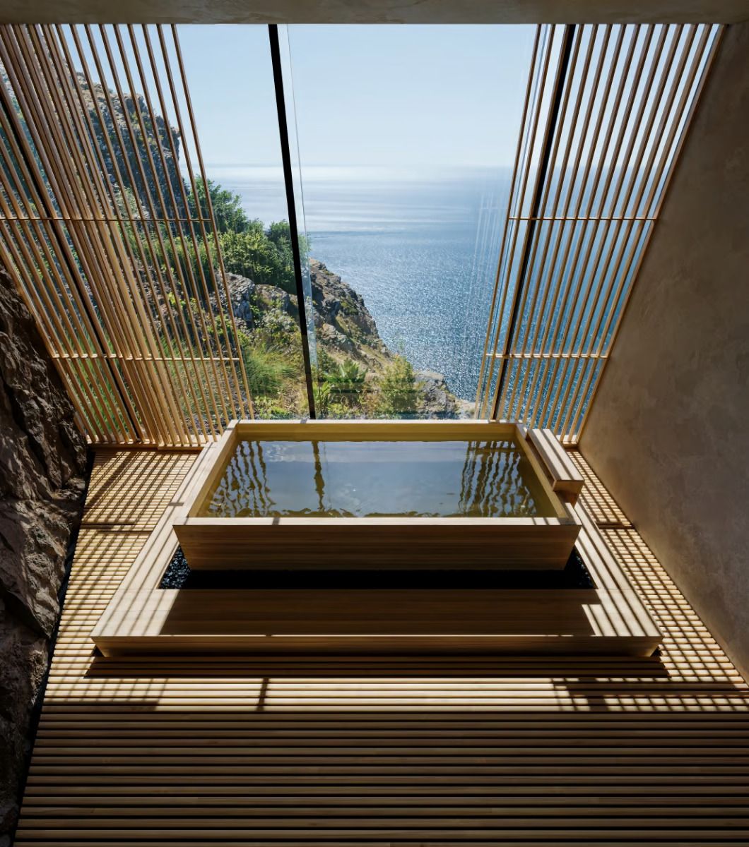 The tranquil Japanese bath with cliffside views of the natural topography (Photo: Instagram / @designboom)