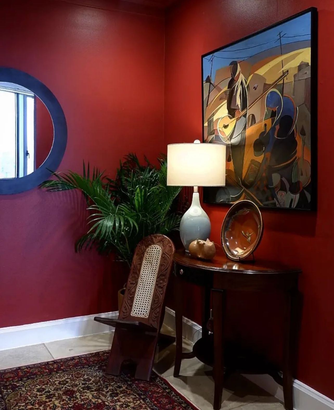 Home design that integrates vibrant colours and textures with African art and furniture (Photo: Casa Buddha)