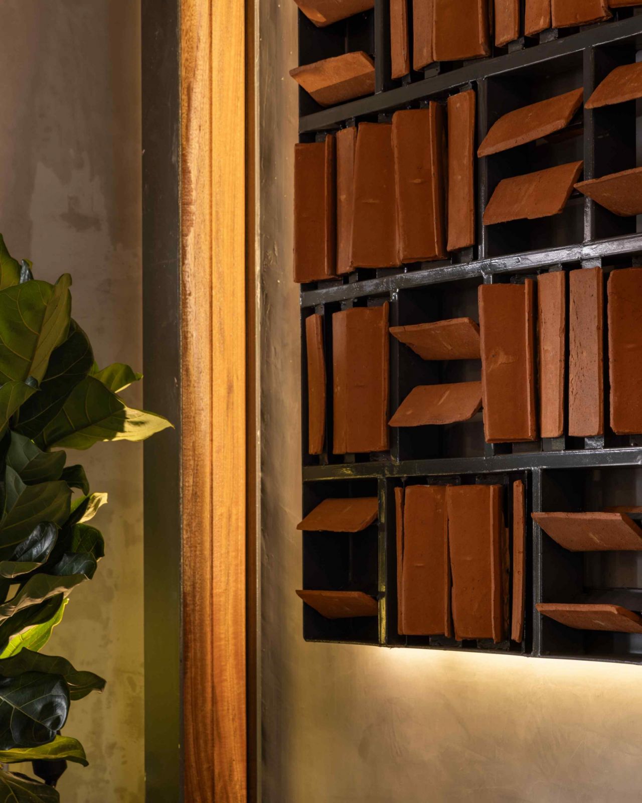 Made from repurposed clay roof tiles salvaged from the main roof during renovation