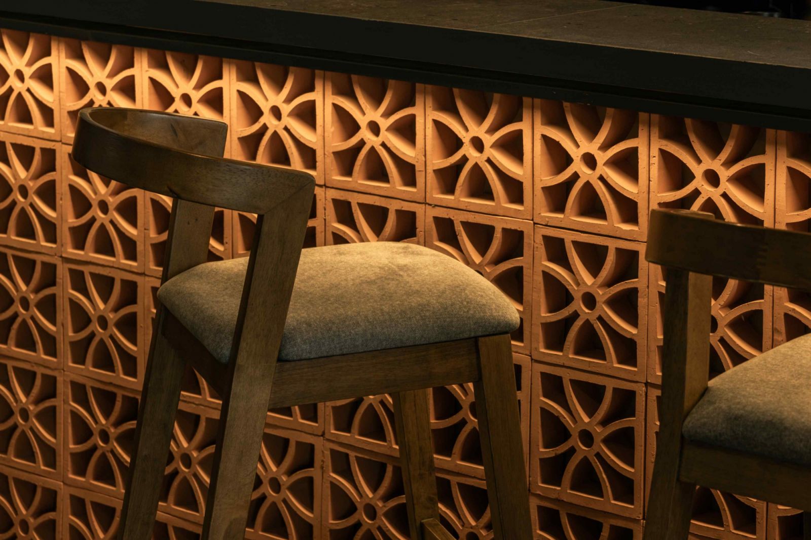 Terracotta breeze blocks accentuate the cultural resonance
